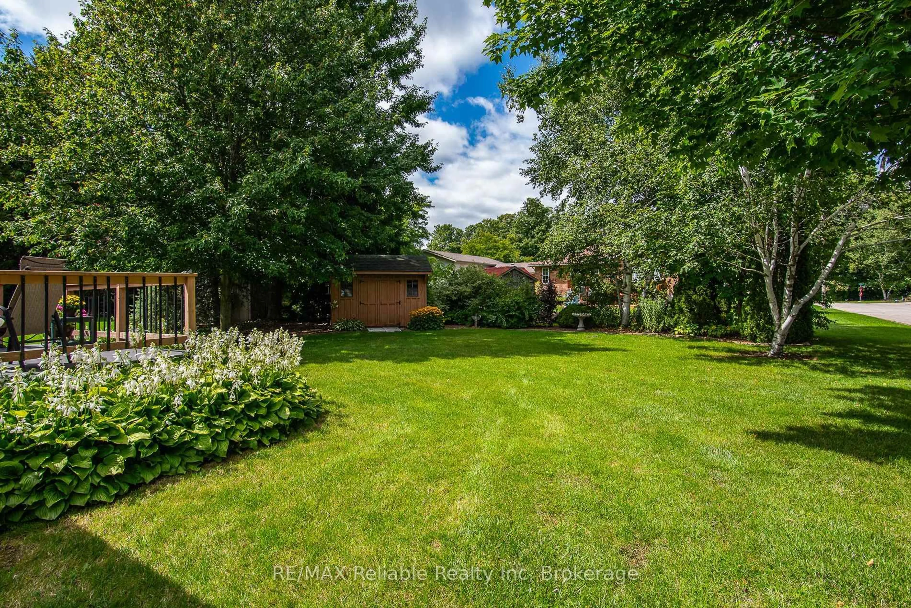 A pic from outside/outdoor area/front of a property/back of a property/a pic from drone, forest/trees view for 61 Church St, Huron East Ontario N0K 1W0