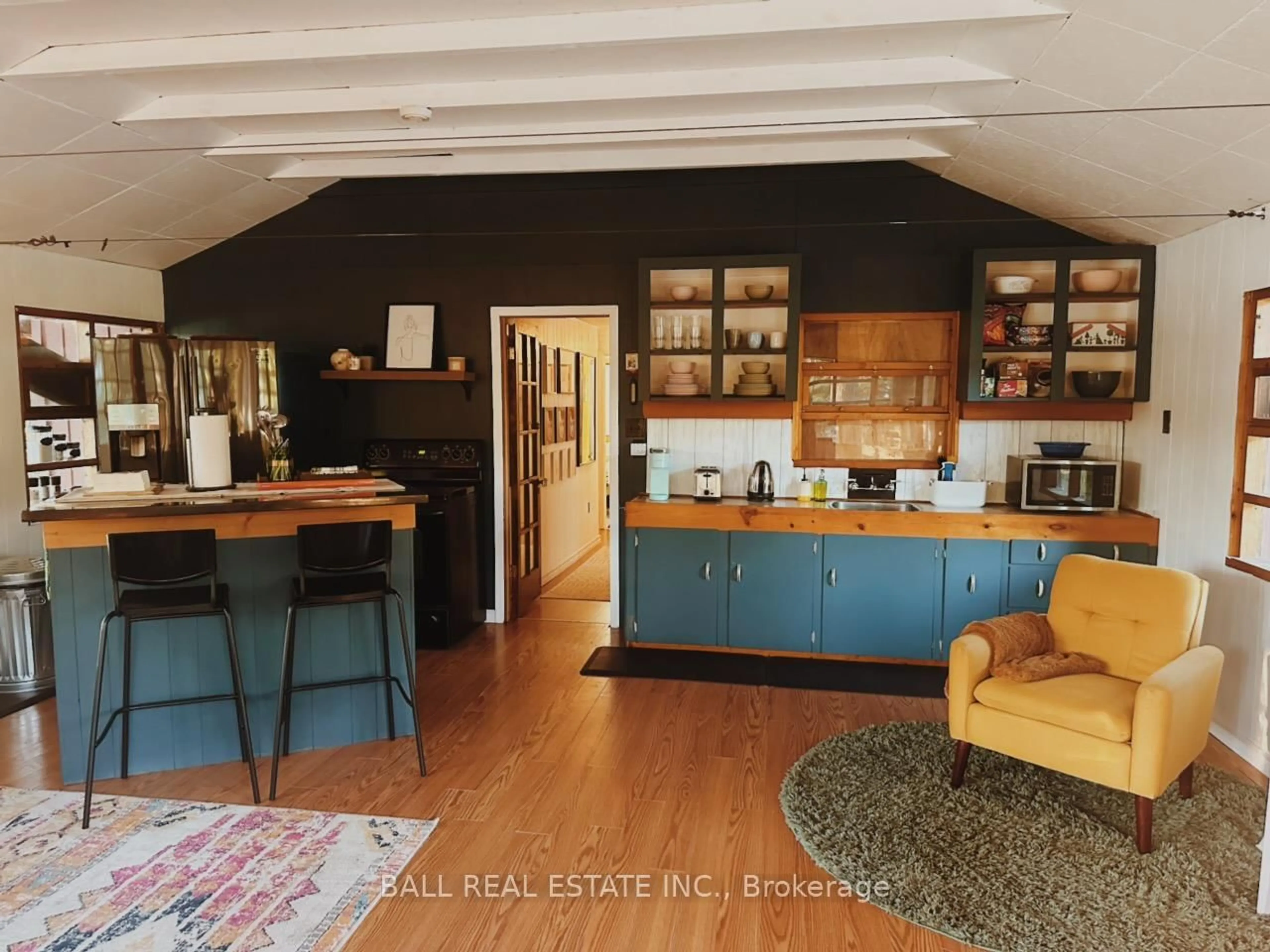 Open concept kitchen, wood/laminate floor for 260 Island 26, Trent Lakes Ontario K0L 1J0