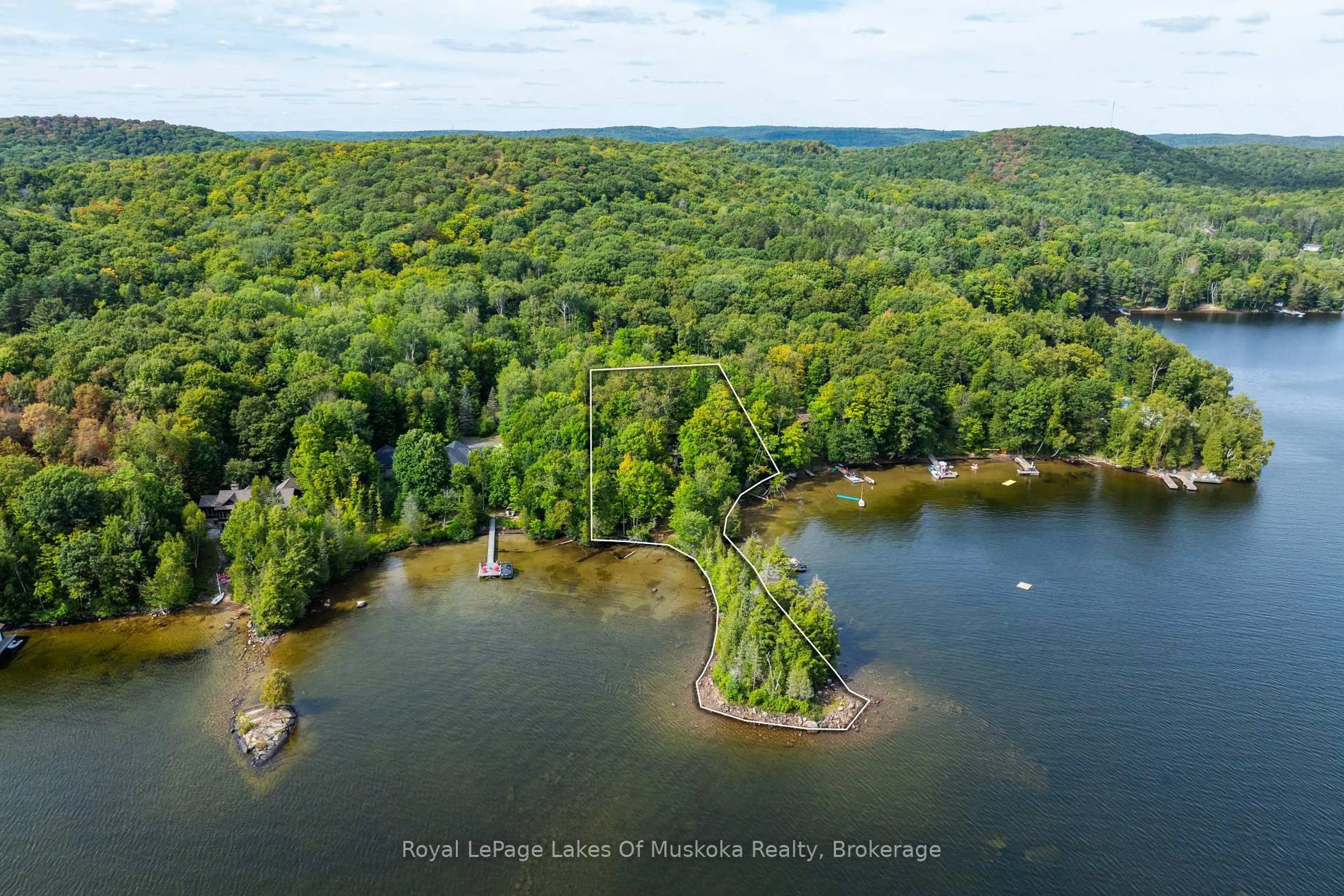 A pic from outside/outdoor area/front of a property/back of a property/a pic from drone, water/lake/river/ocean view for 1053 Robson Lane, Lake of Bays Ontario P0A 1H0