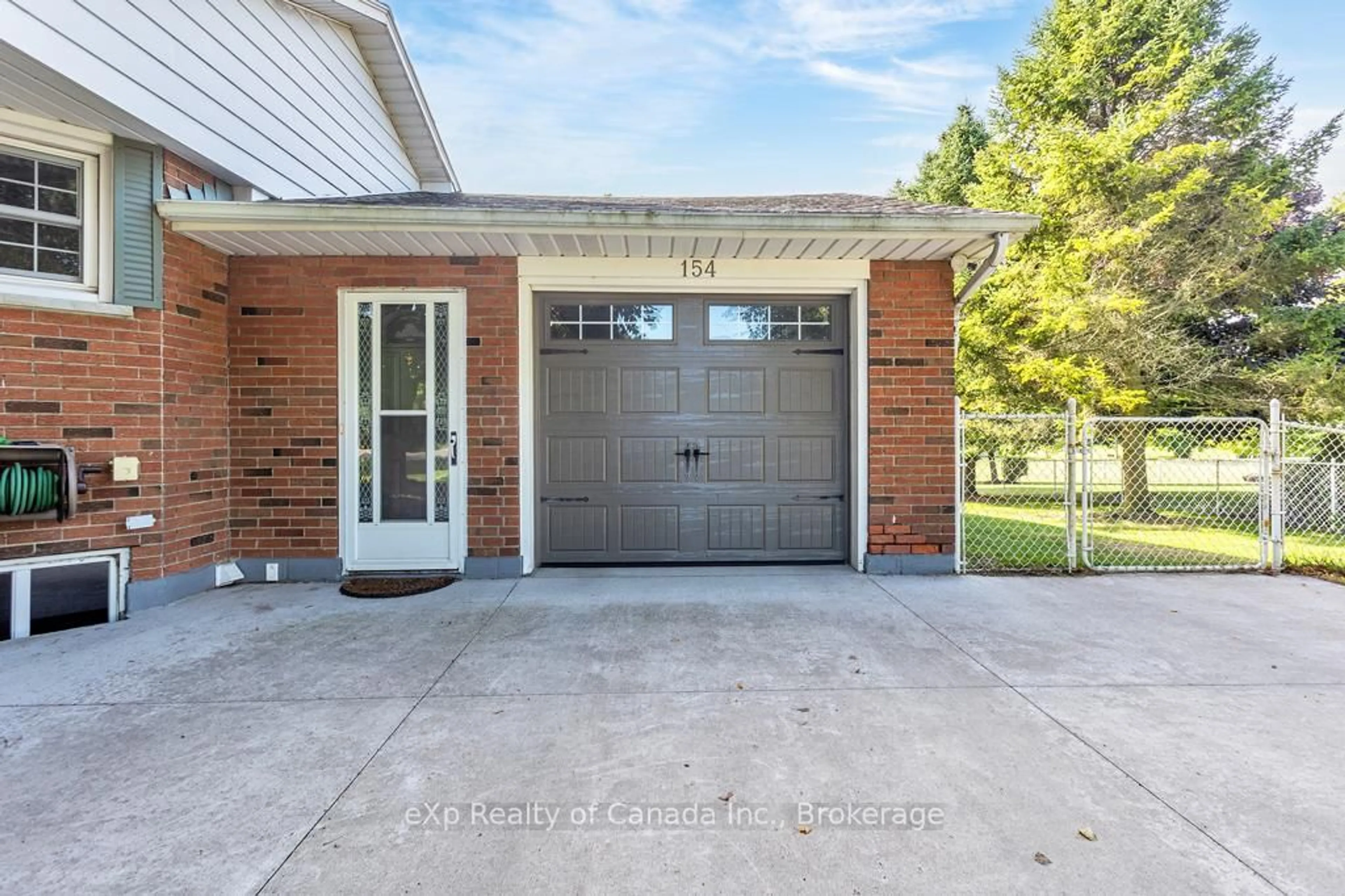 Home with brick exterior material, street for 154 Main St, Norfolk Ontario N0J 1E0