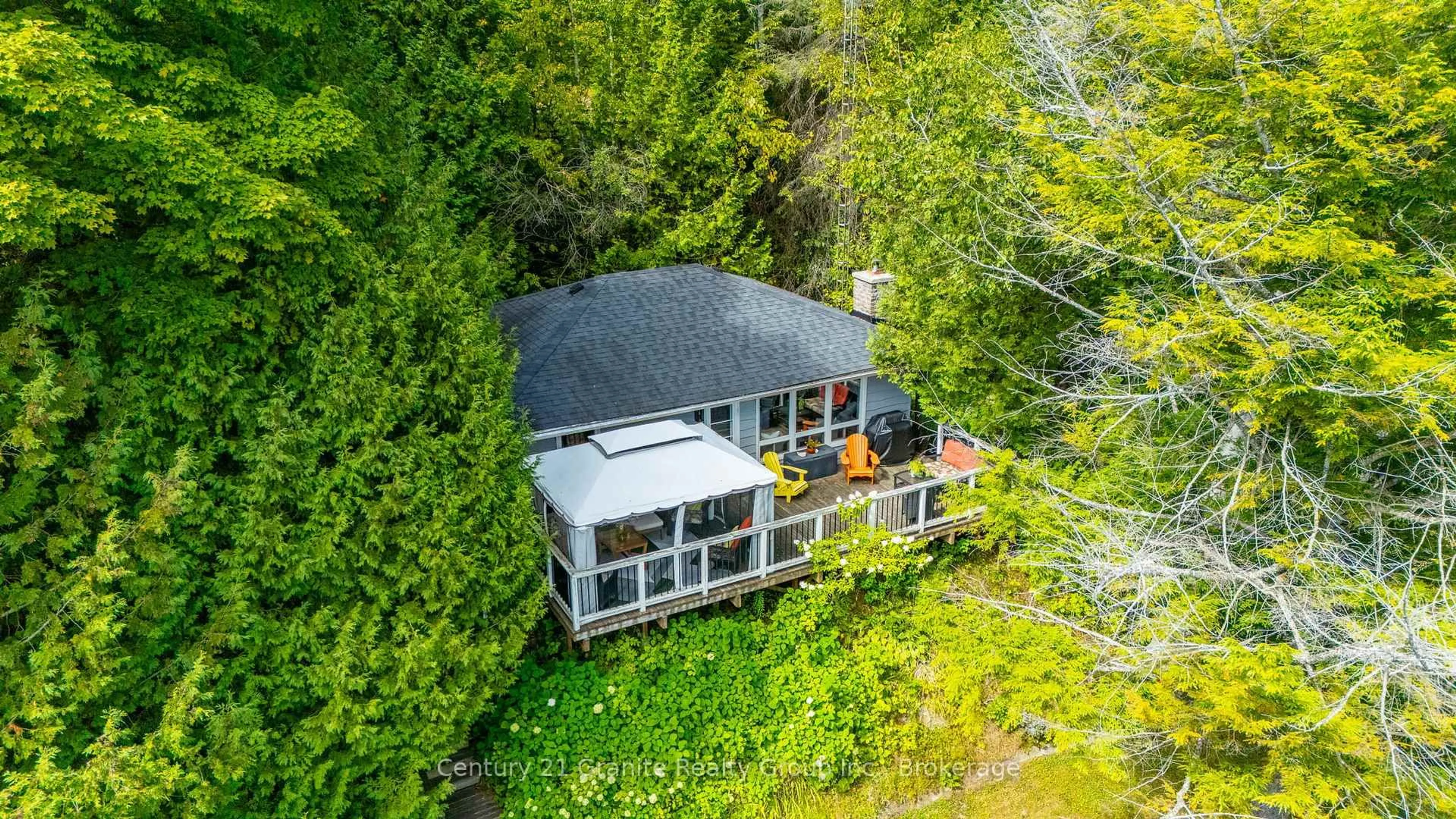 A pic from outside/outdoor area/front of a property/back of a property/a pic from drone, water/lake/river/ocean view for 1291 Shanahan Tr, Minden Hills Ontario K0M 2K0