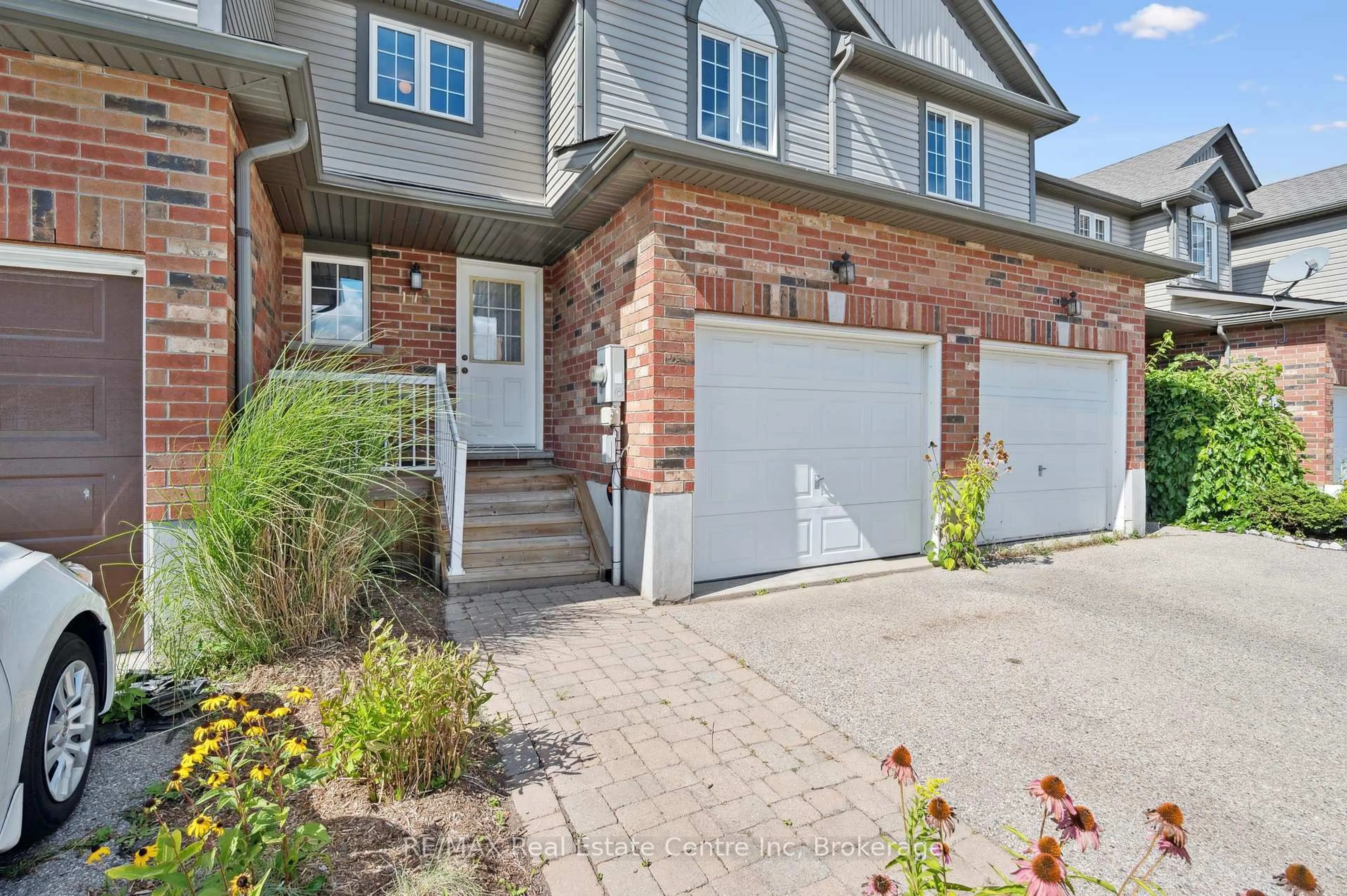 Home with brick exterior material, street for 179 Prosperity Dr, Kitchener Ontario N2E 4E5