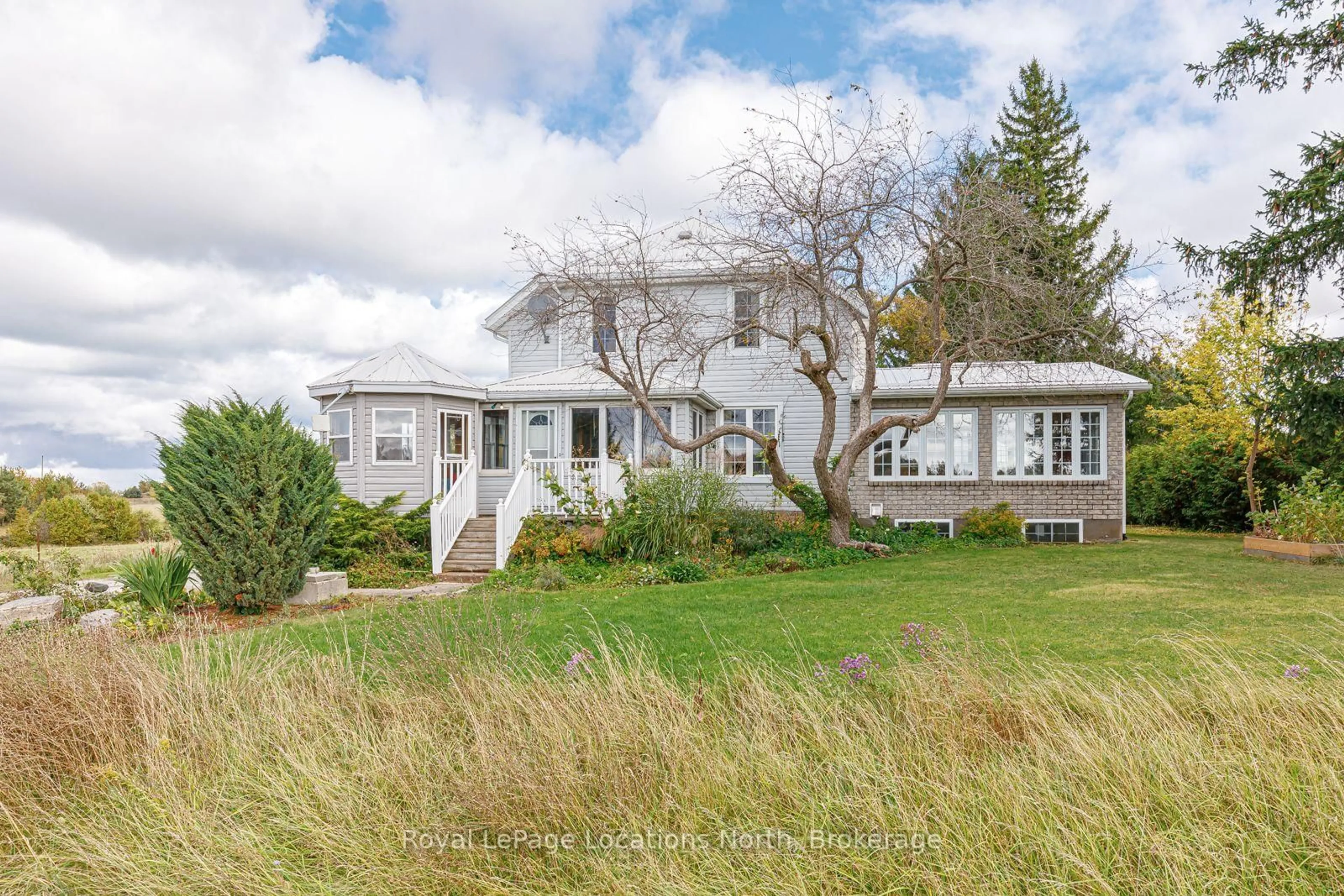 A pic from outside/outdoor area/front of a property/back of a property/a pic from drone, unknown for 788070 Grey Road 13, Blue Mountains Ontario N0H 1J0
