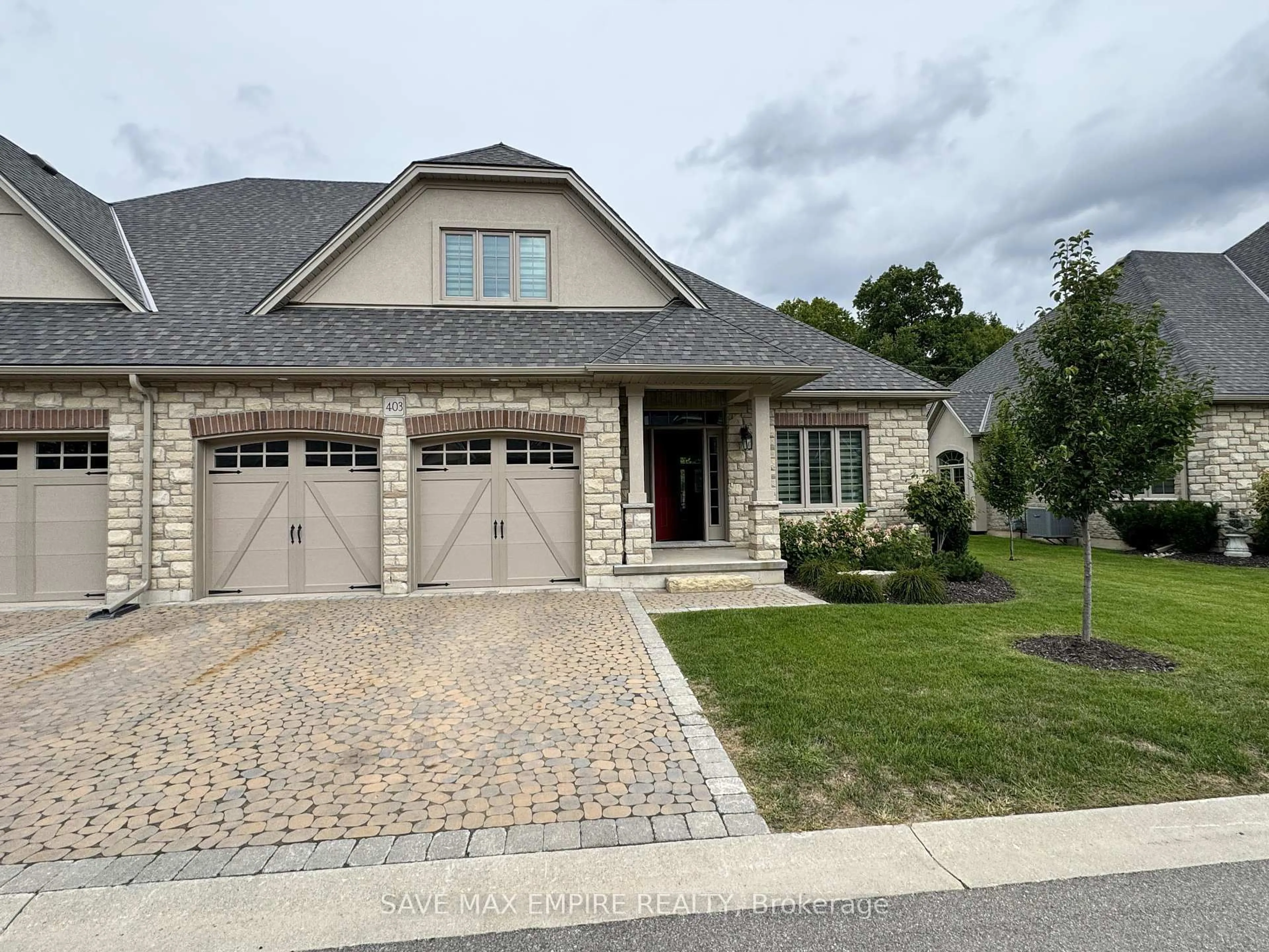 Home with brick exterior material, street for 5 Wood Haven Dr #403, Tillsonburg Ontario N4G 0A8