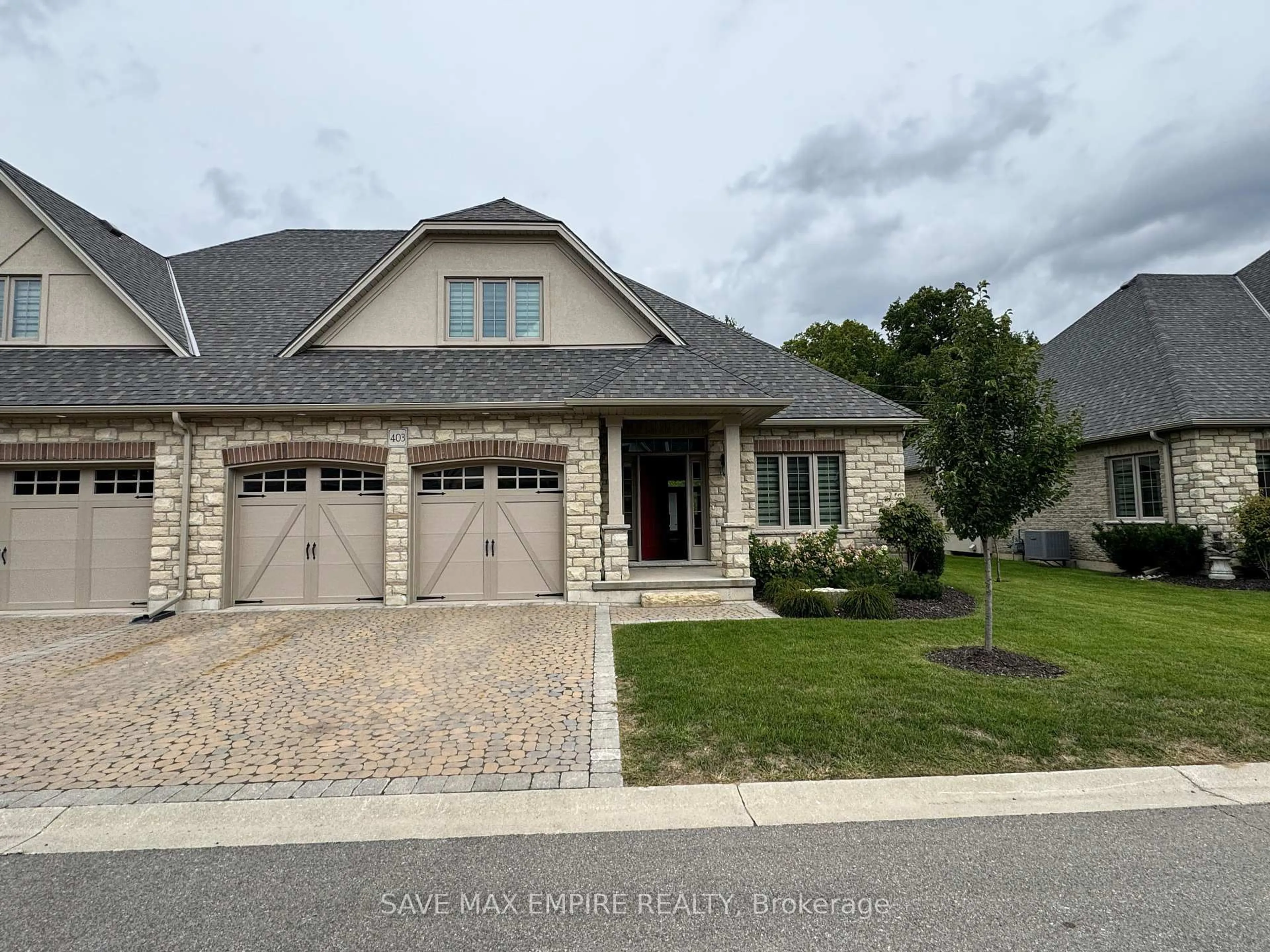 Home with brick exterior material, street for 5 Wood Haven Dr #403, Tillsonburg Ontario N4G 0A8