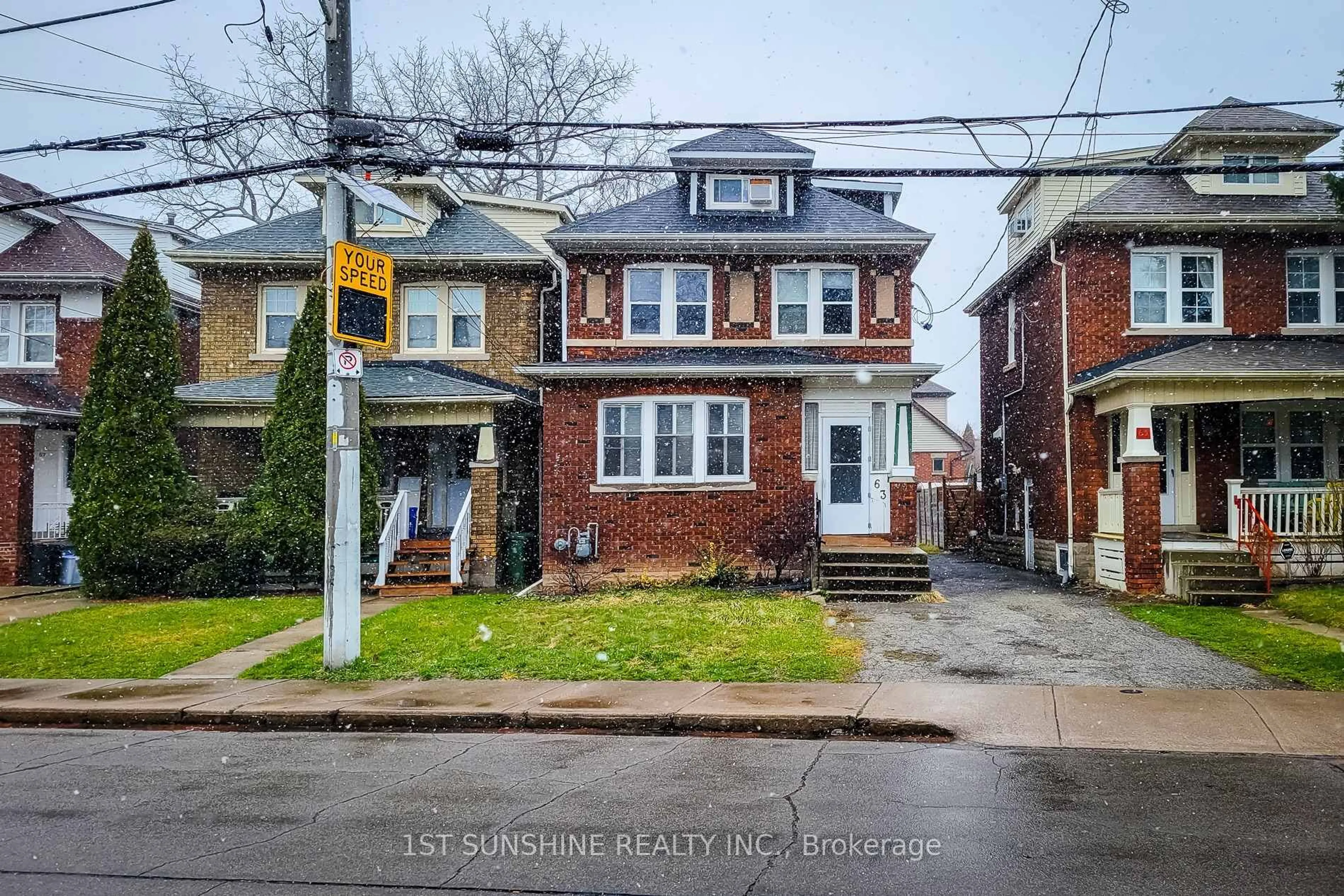 Home with brick exterior material, street for 63 Paisley Ave, Hamilton Ontario L8S 1V2