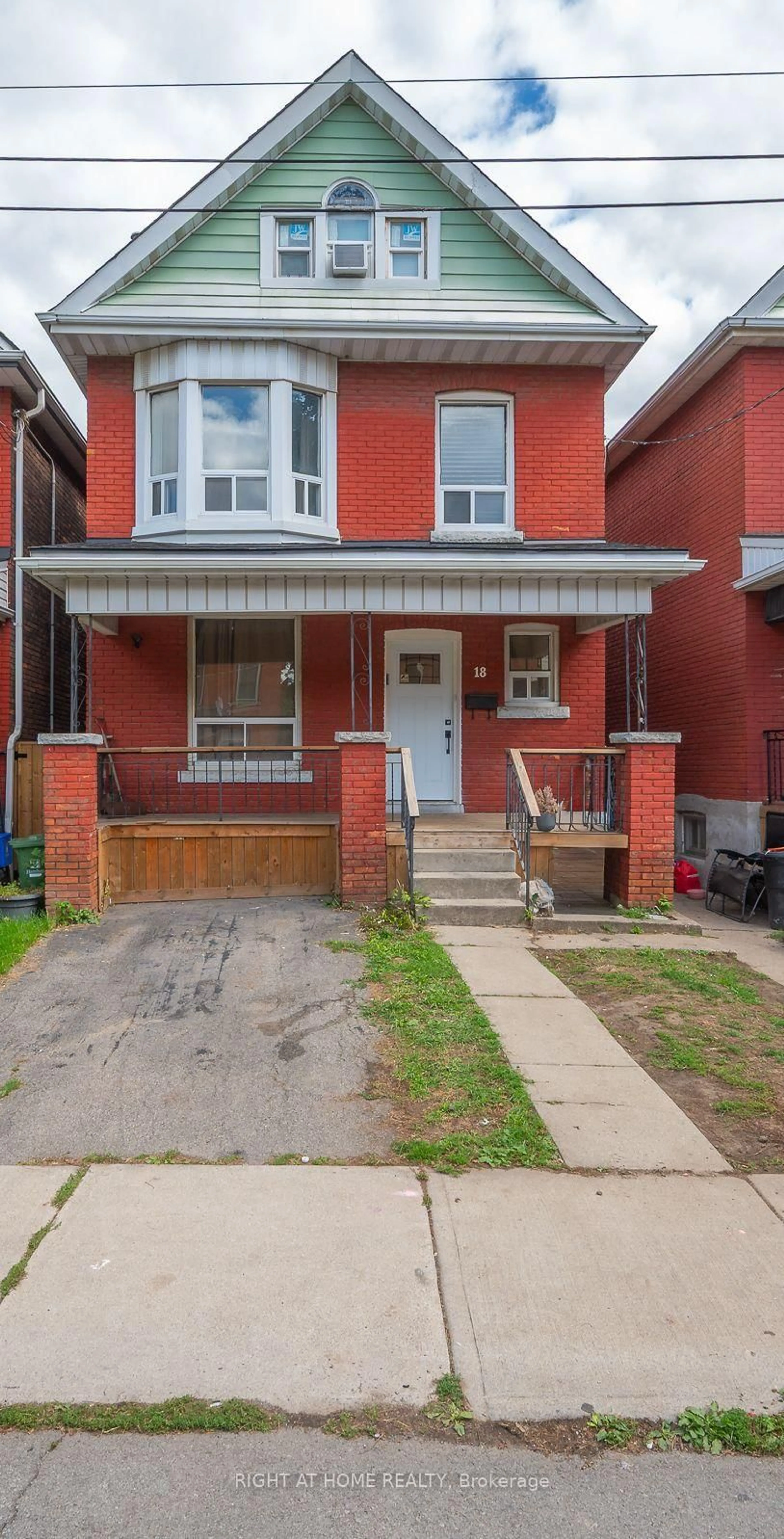Home with brick exterior material, street for 18 Huntley St, Hamilton Ontario L8L 5X7
