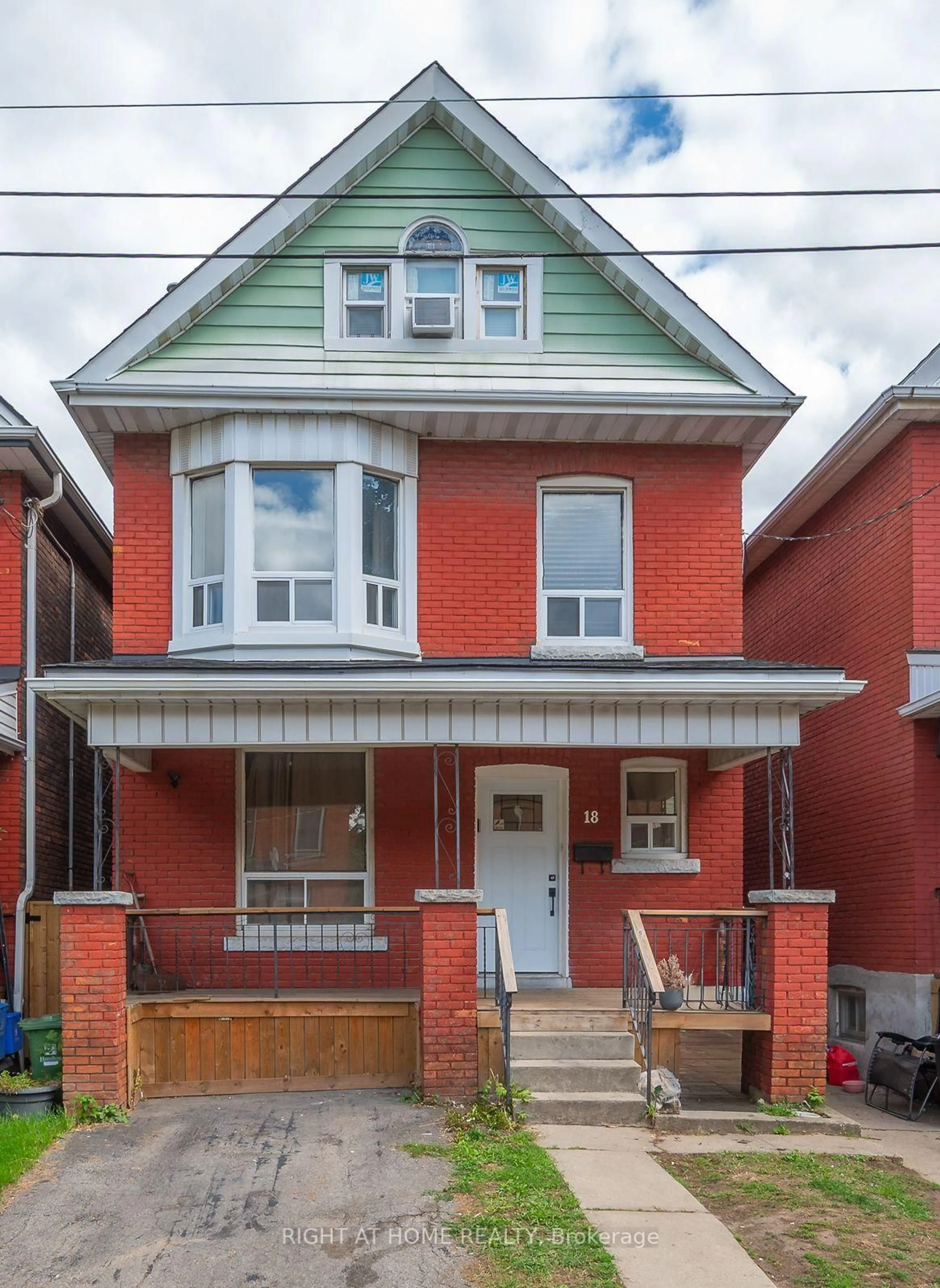 Home with brick exterior material, street for 18 Huntley St, Hamilton Ontario L8L 5X7