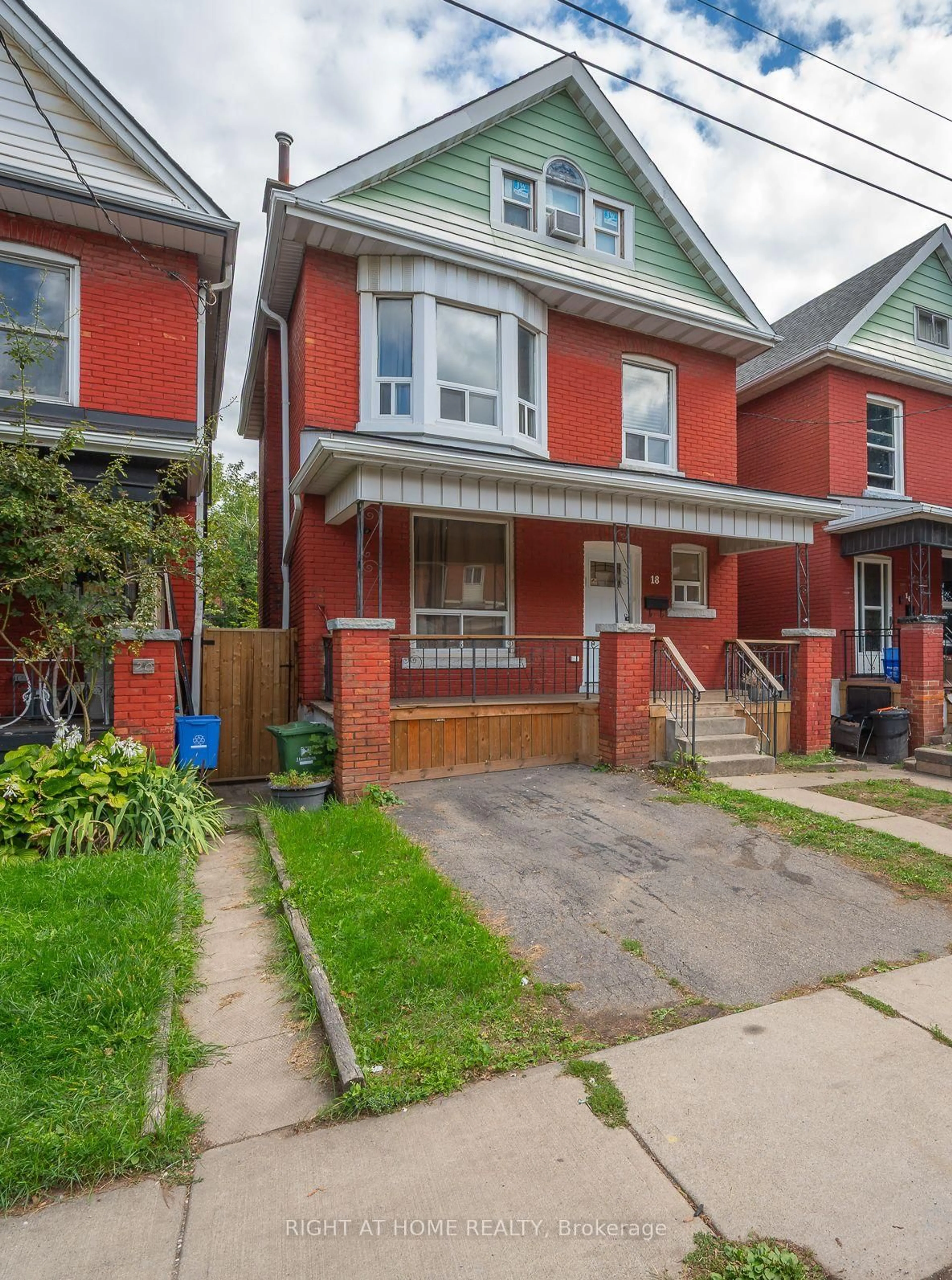 Home with brick exterior material, street for 18 Huntley St, Hamilton Ontario L8L 5X7
