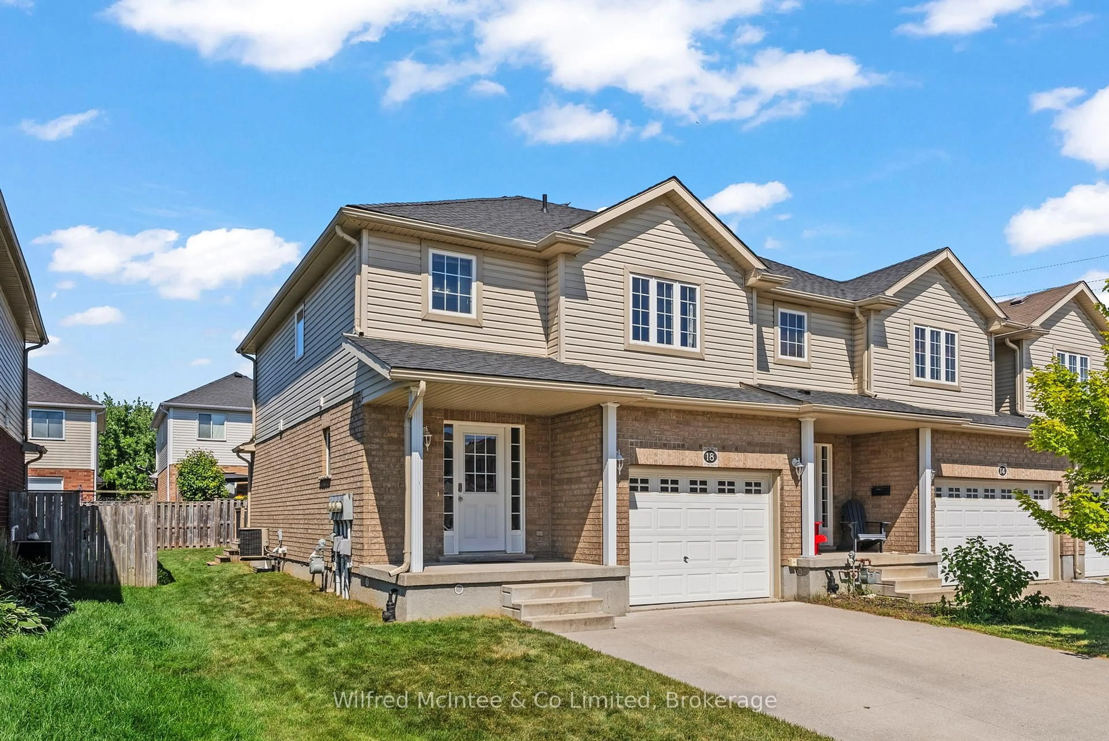 Home with brick exterior material, street for 18 Poffenroth Path, Woolwich Ontario N3B 3P5