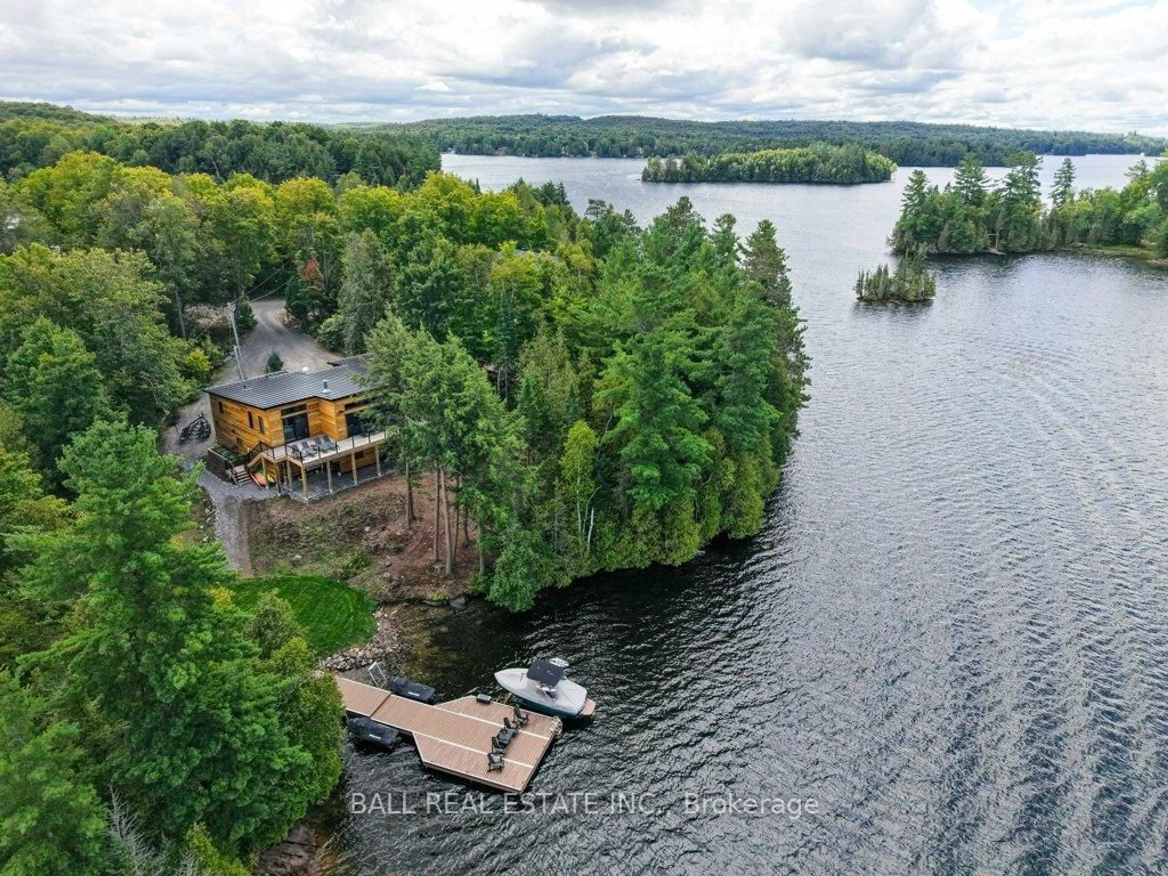 A pic from outside/outdoor area/front of a property/back of a property/a pic from drone, water/lake/river/ocean view for 1432 Abrams Rd, Highlands East Ontario K0L 1C0