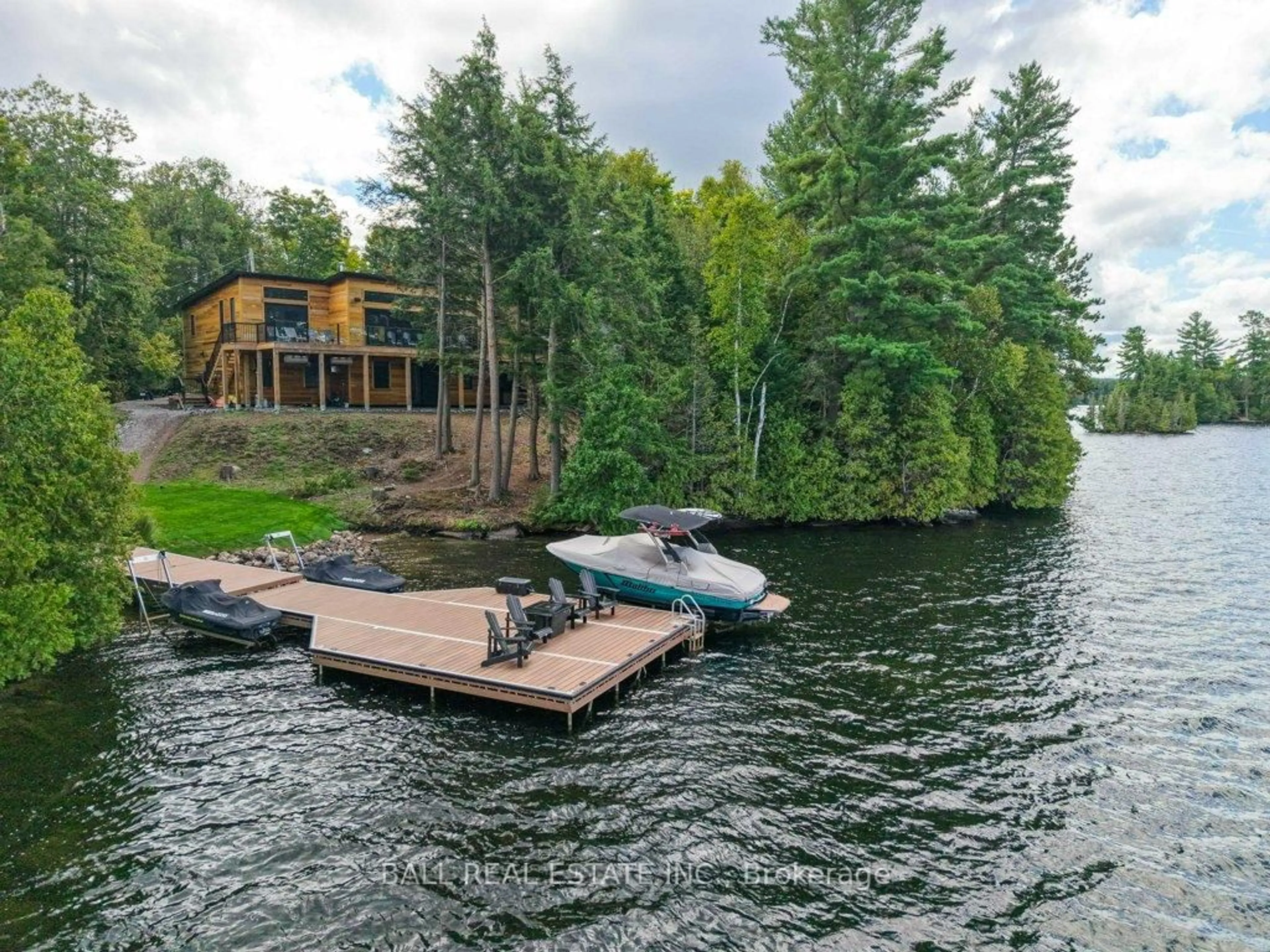 A pic from outside/outdoor area/front of a property/back of a property/a pic from drone, water/lake/river/ocean view for 1432 Abrams Rd, Highlands East Ontario K0L 1C0