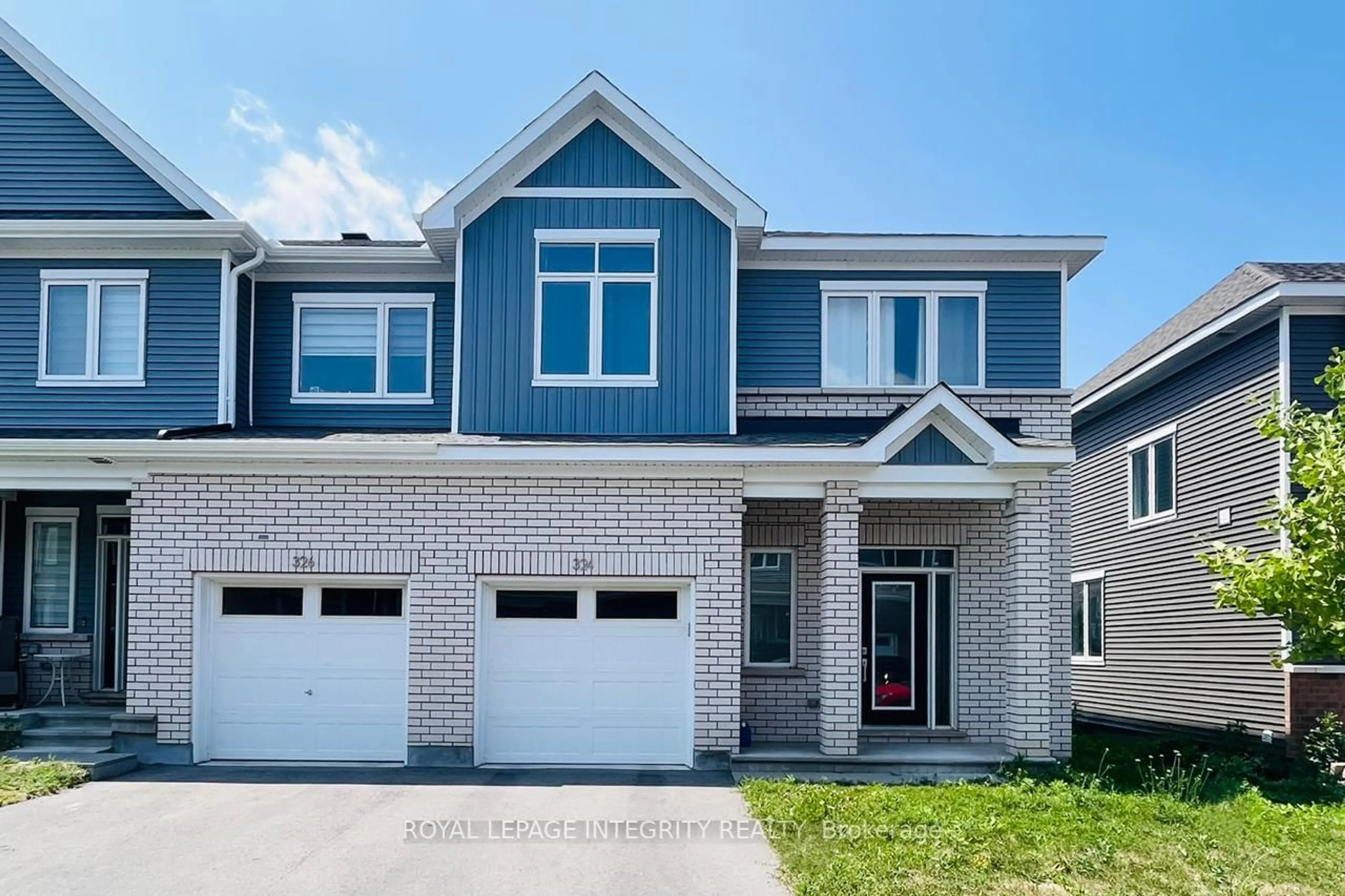 Home with brick exterior material, street for 324 Canadensis Lane, Ottawa Ontario K2J 6X8