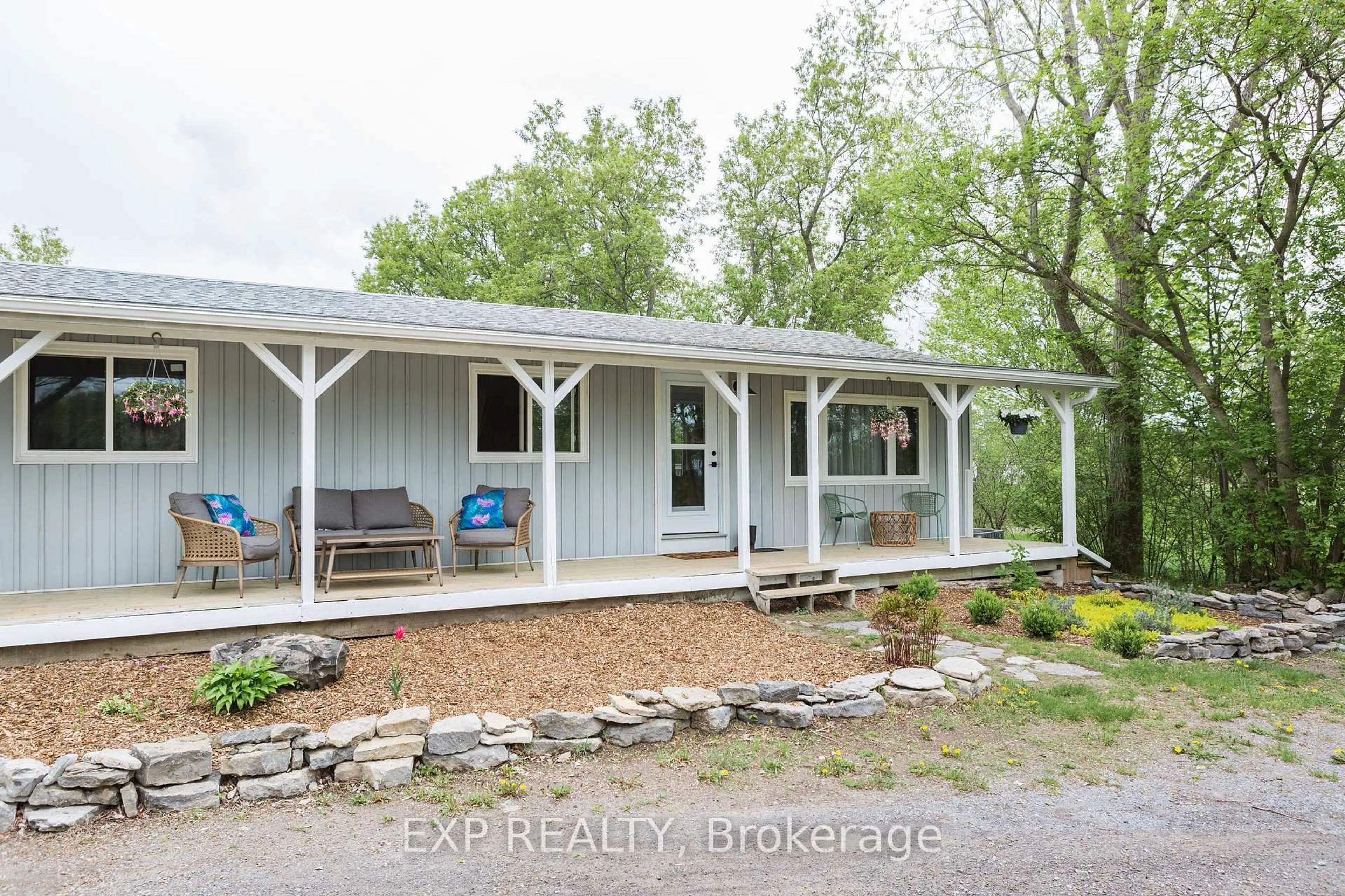 Home with vinyl exterior material, water/lake/river/ocean view for 825 County Road 8 Rd, Prince Edward County Ontario K0K 2T0