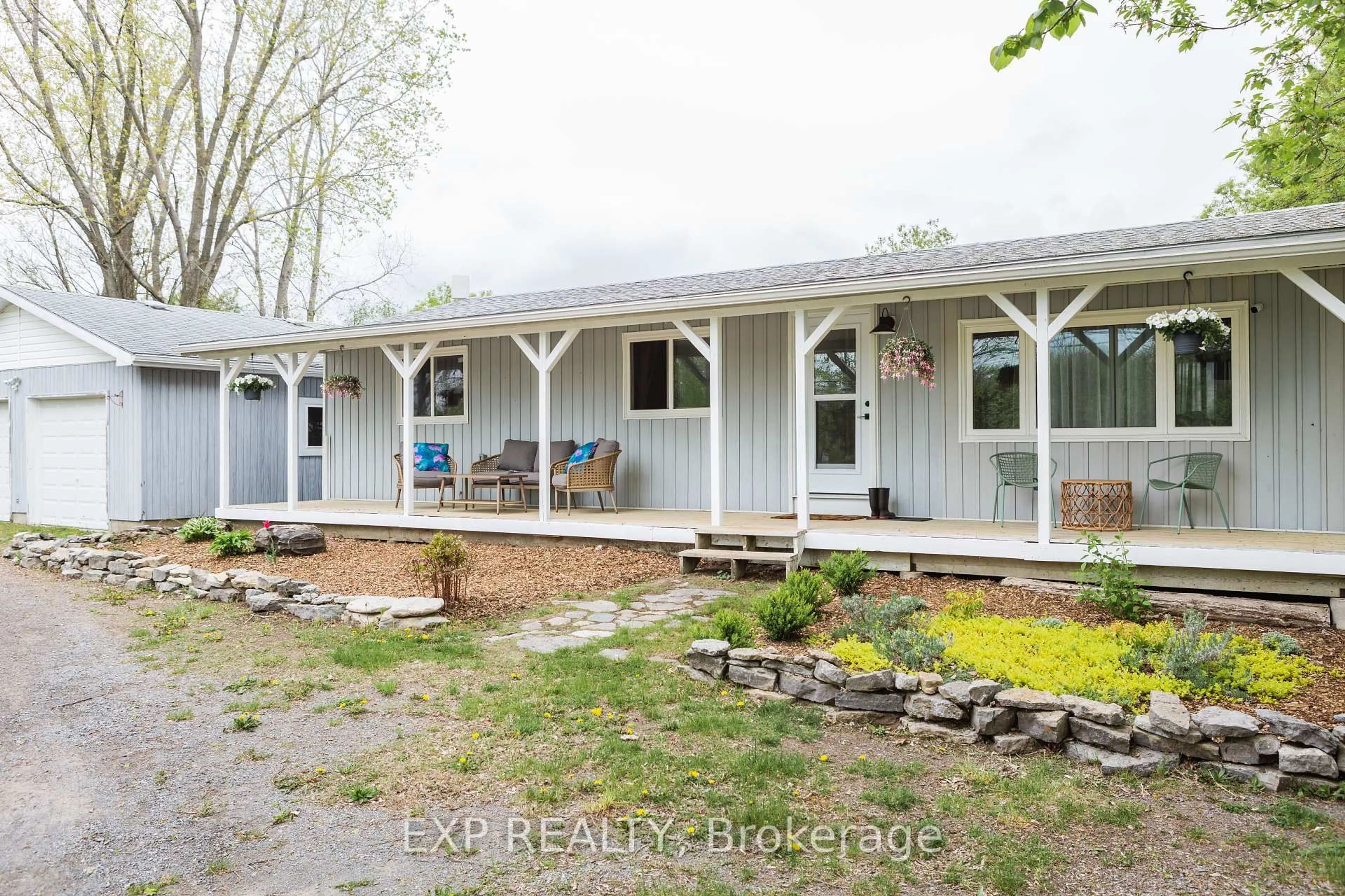 A pic from outside/outdoor area/front of a property/back of a property/a pic from drone, unknown for 825 County Road 8 Rd, Prince Edward County Ontario K0K 2T0