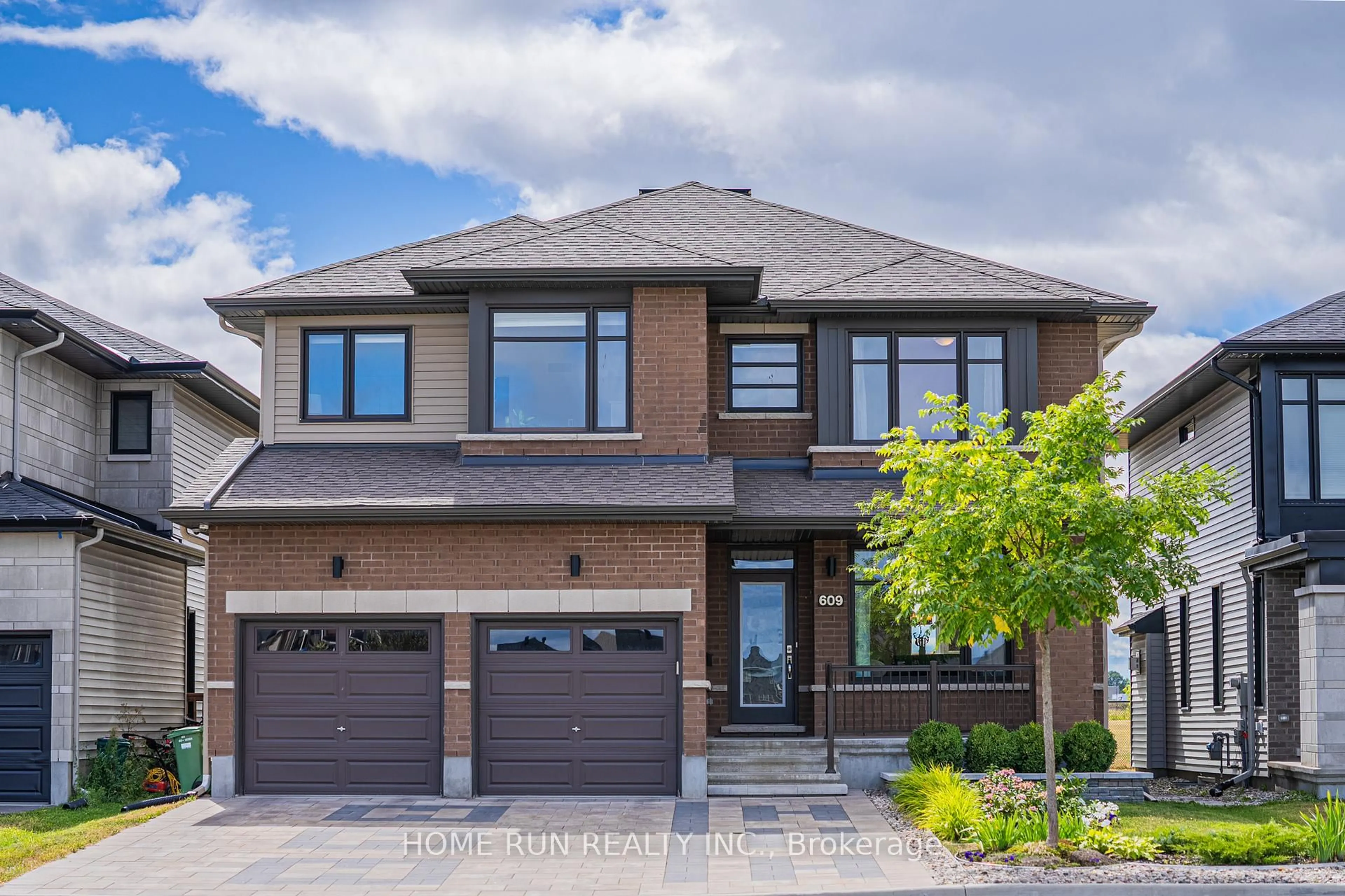Home with brick exterior material, street for 609 Triangle St, Stittsville Ontario K2V 0L8