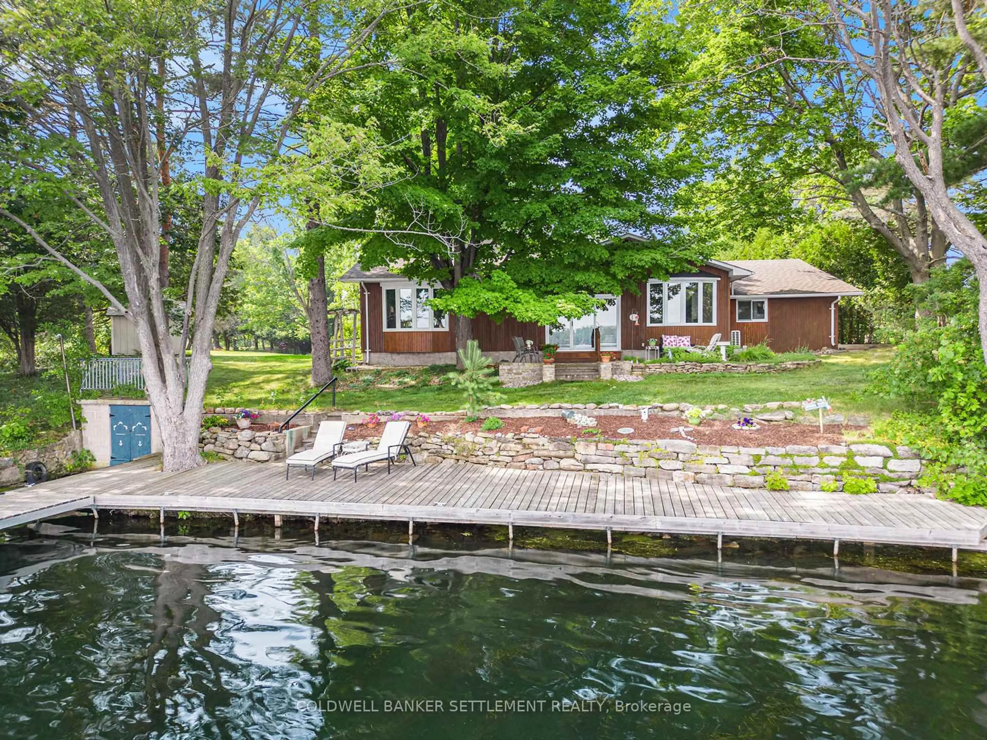 A pic from outside/outdoor area/front of a property/back of a property/a pic from drone, water/lake/river/ocean view for 65 Blue Heron Lane, Rideau Lakes Ontario K0G 1X0