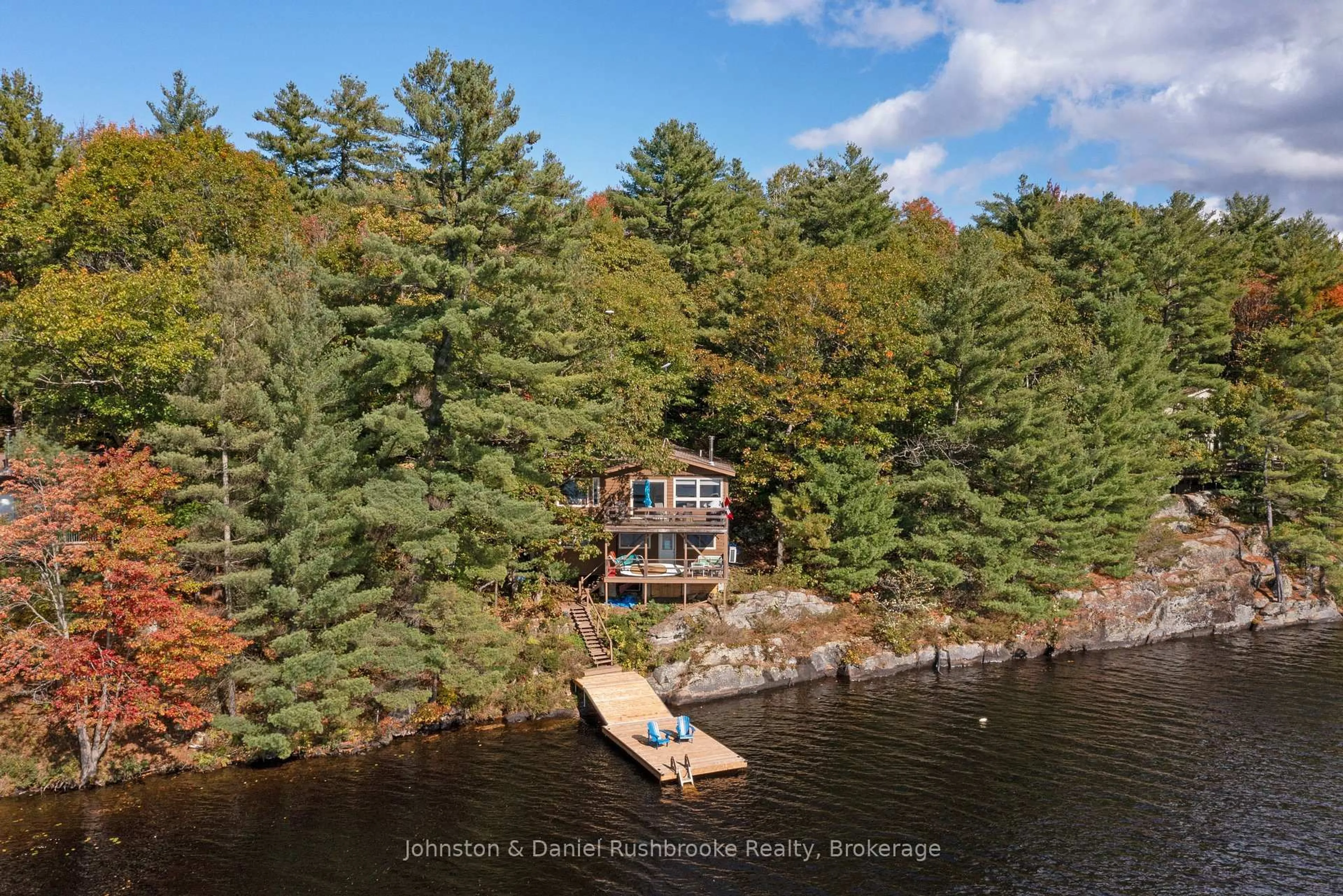 A pic from outside/outdoor area/front of a property/back of a property/a pic from drone, water/lake/river/ocean view for 621 Peninsula Rd, Gravenhurst Ontario P1P 1R2