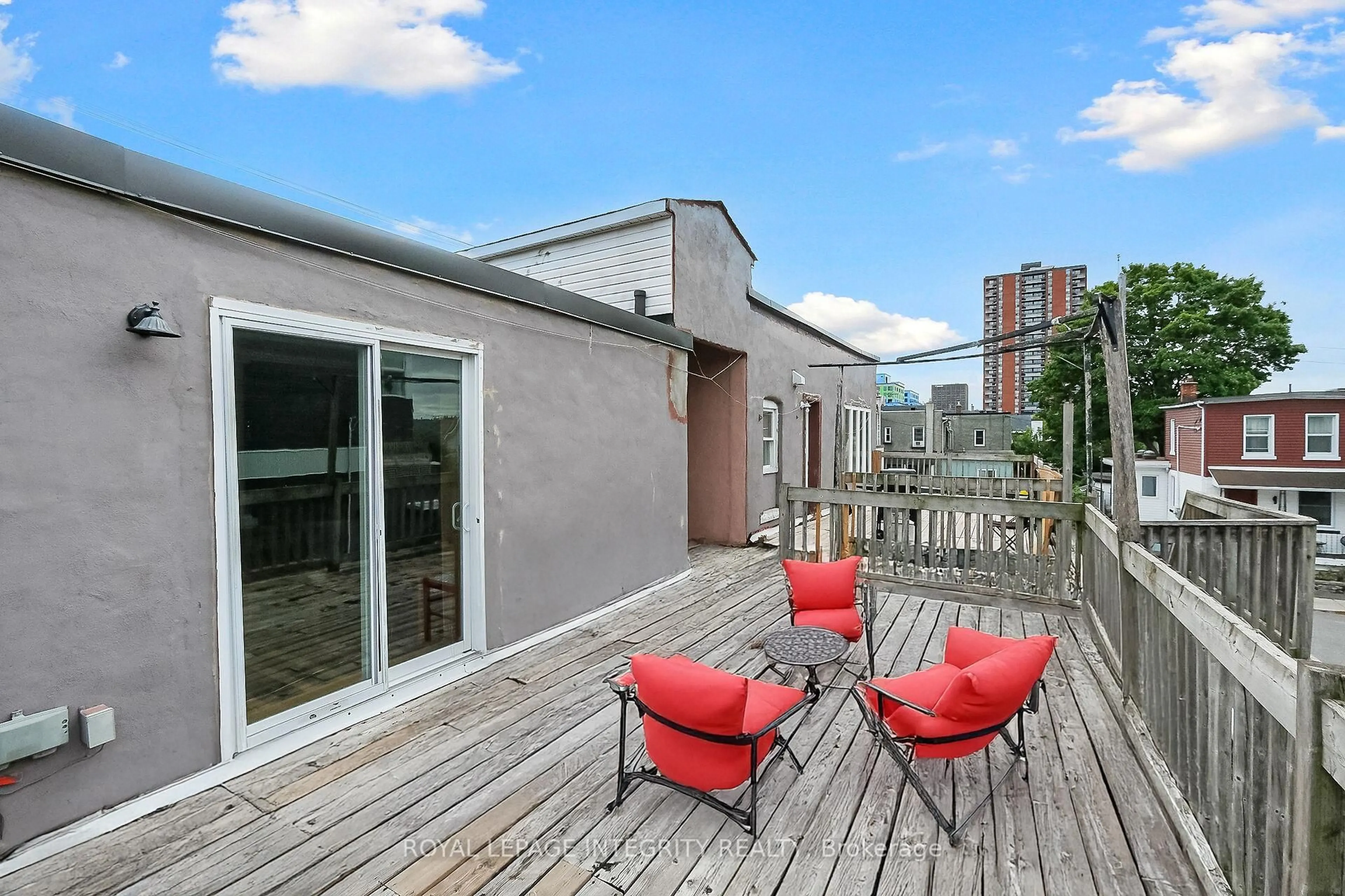Patio, city buildings view from balcony for 202 Rochester St #6, Ottawa Ontario K1R 7M6