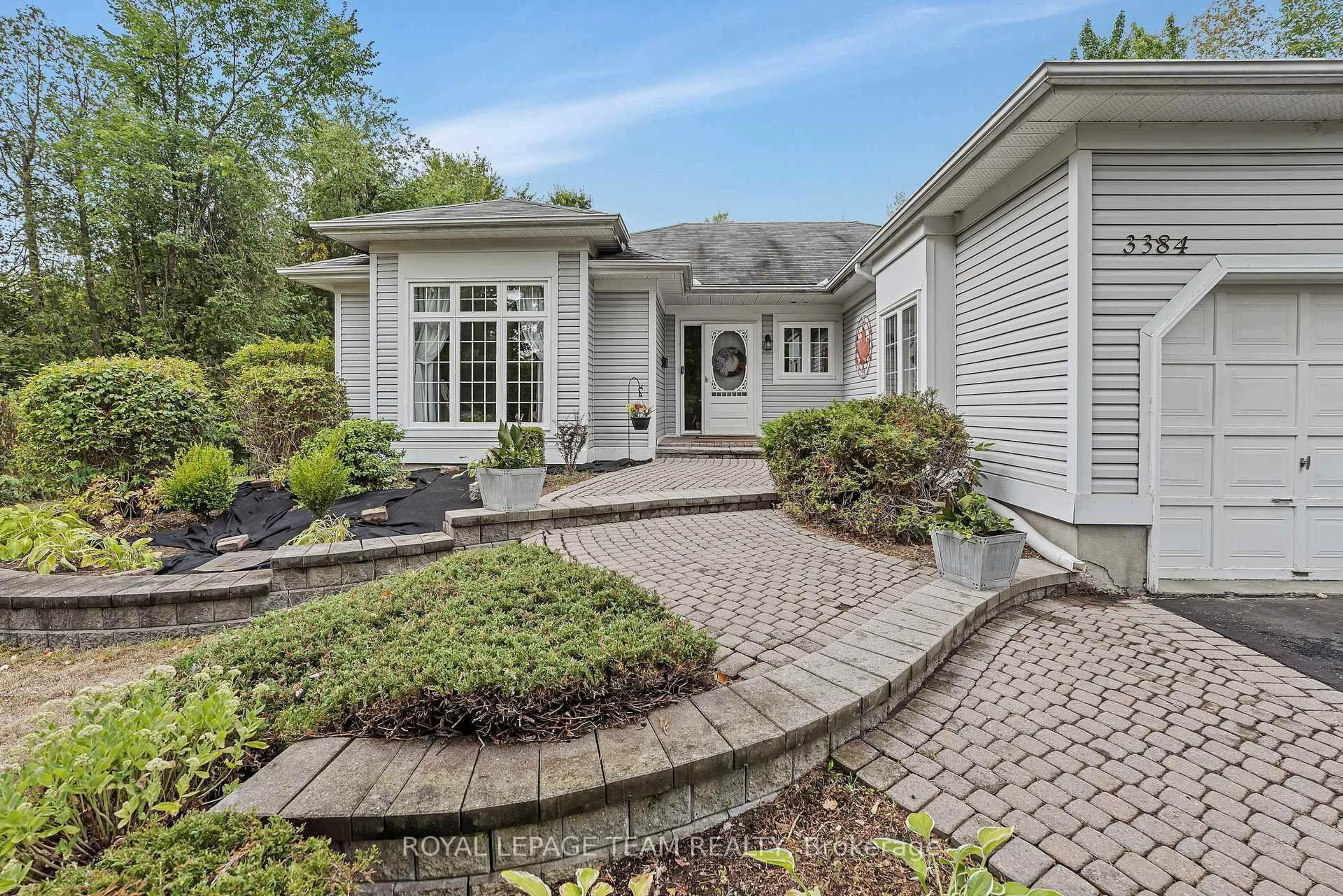 Home with brick exterior material, street for 3384 Bramble Lane, Osgoode Ontario K0A 2W0