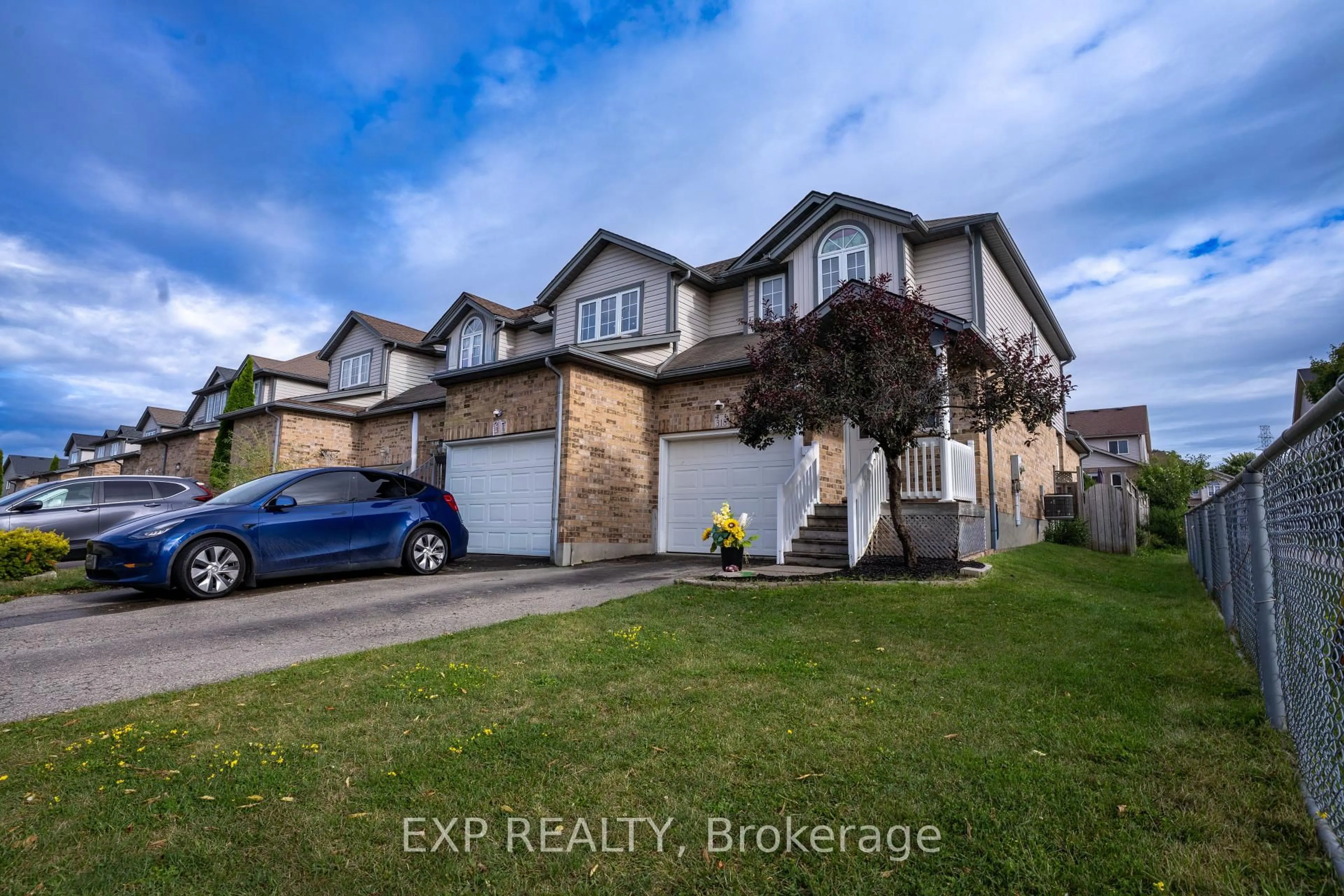 A pic from outside/outdoor area/front of a property/back of a property/a pic from drone, street for 318 Activa Ave, Kitchener Ontario N2E 3V1