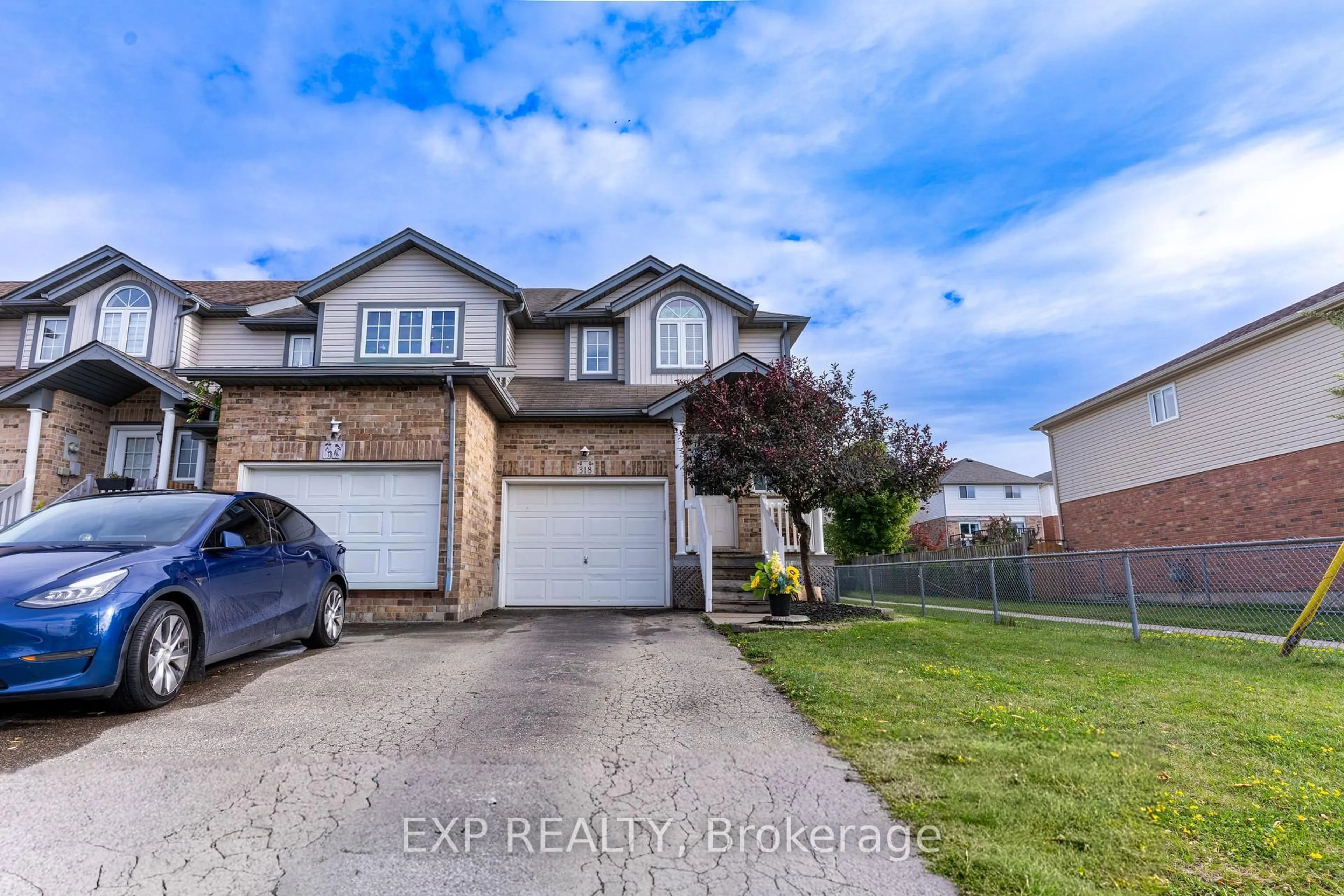 A pic from outside/outdoor area/front of a property/back of a property/a pic from drone, street for 318 Activa Ave, Kitchener Ontario N2E 3V1