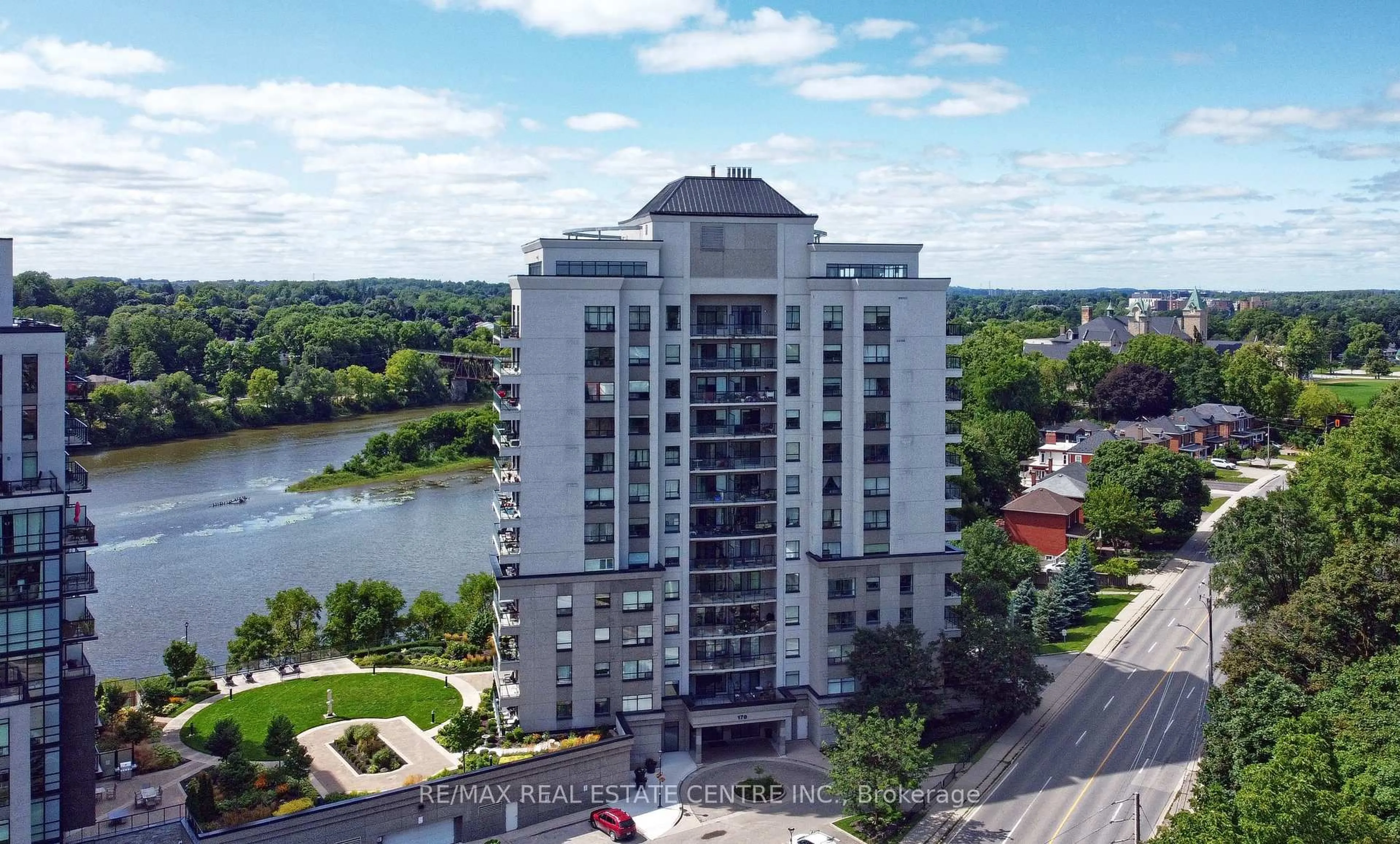 A pic from outside/outdoor area/front of a property/back of a property/a pic from drone, water/lake/river/ocean view for 170 Water St #308, Cambridge Ontario N1R 3B6