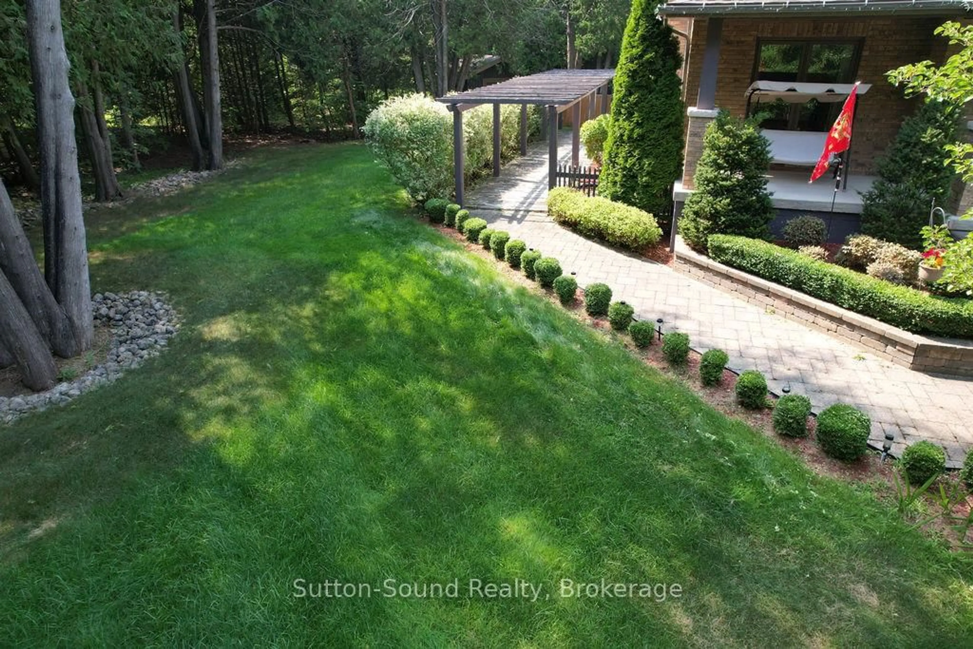 A pic from outside/outdoor area/front of a property/back of a property/a pic from drone, forest/trees view for 318760 Grey Road 1 Rd, Georgian Bluffs Ontario N4K 5N4