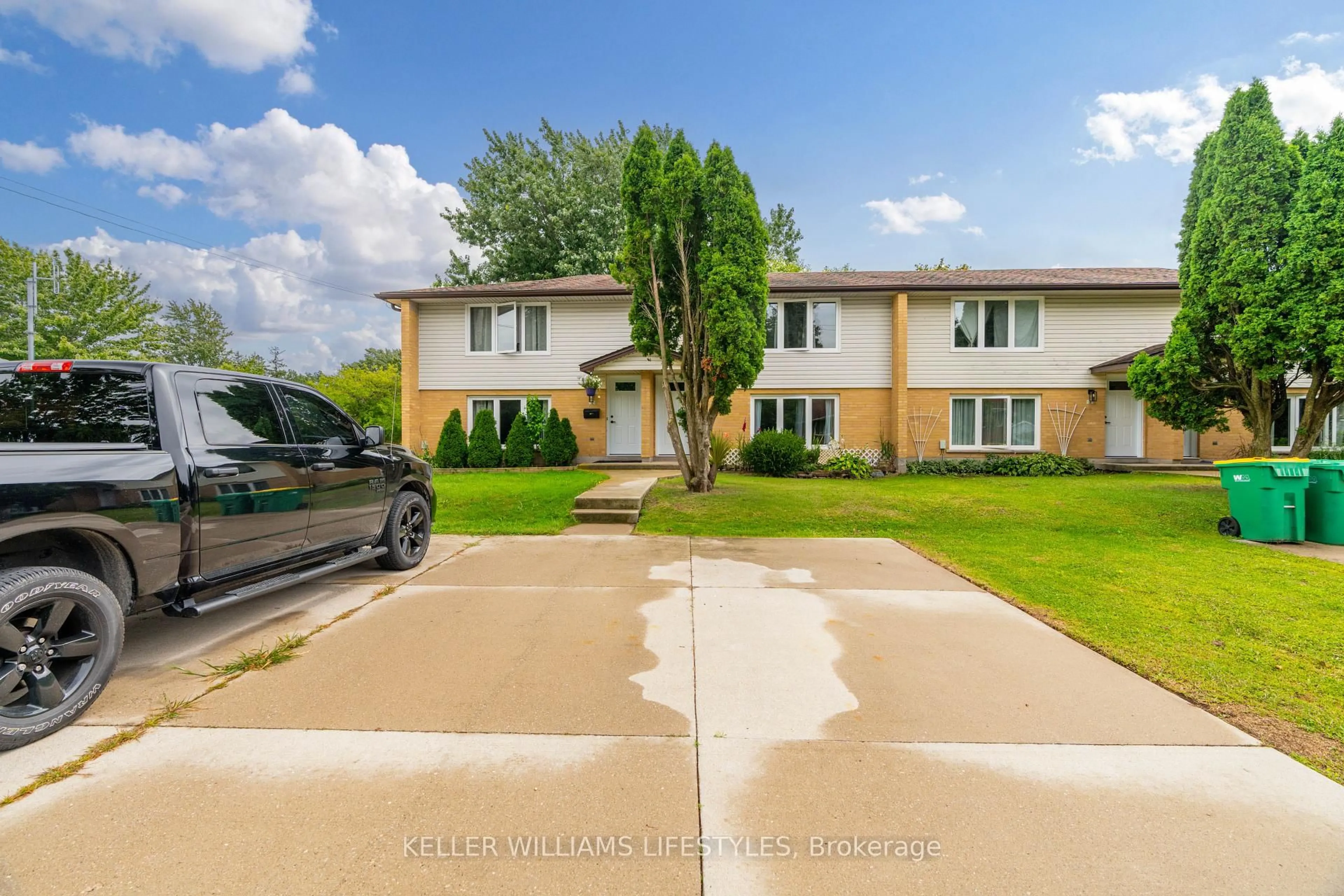 A pic from outside/outdoor area/front of a property/back of a property/a pic from drone, street for 155 Water St #2, Southwest Middlesex Ontario N0L 1M0
