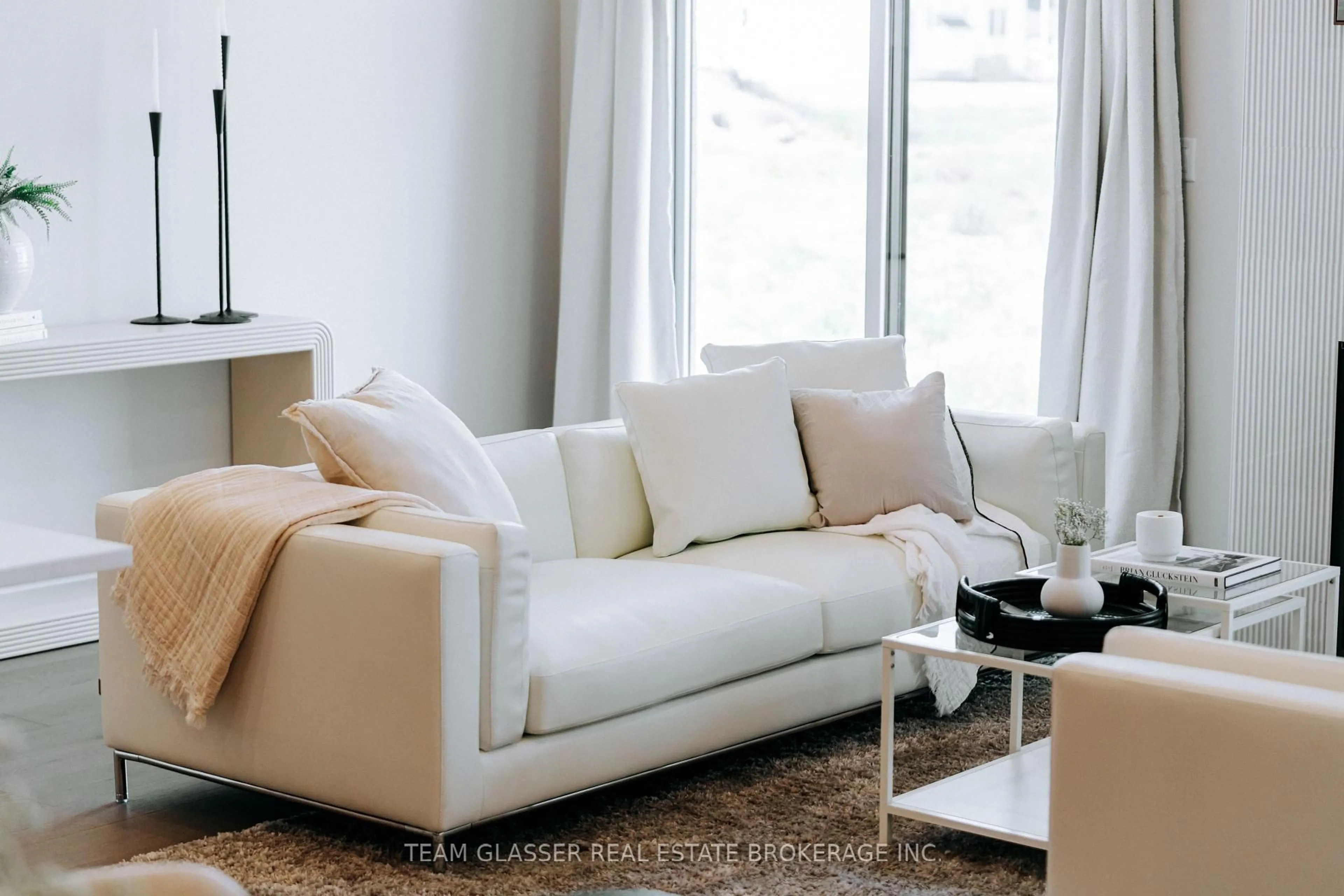 Living room with furniture, carpet floor for 64 Allister LOT 99 Dr, Middlesex Centre Ontario N0L 1R0