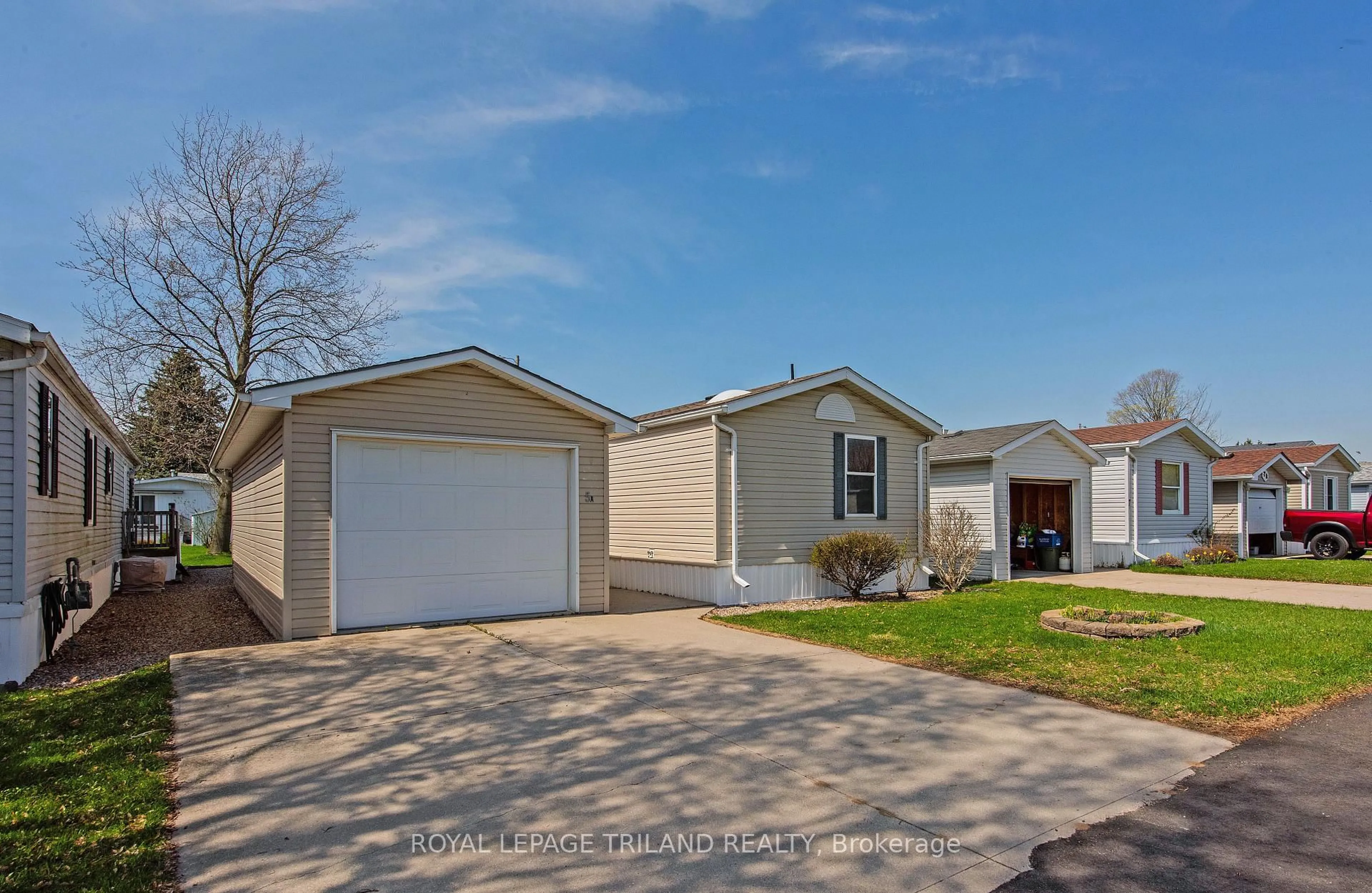 Home with vinyl exterior material, street for 5 Stewart St #A, Strathroy-Caradoc Ontario N7G 1A1