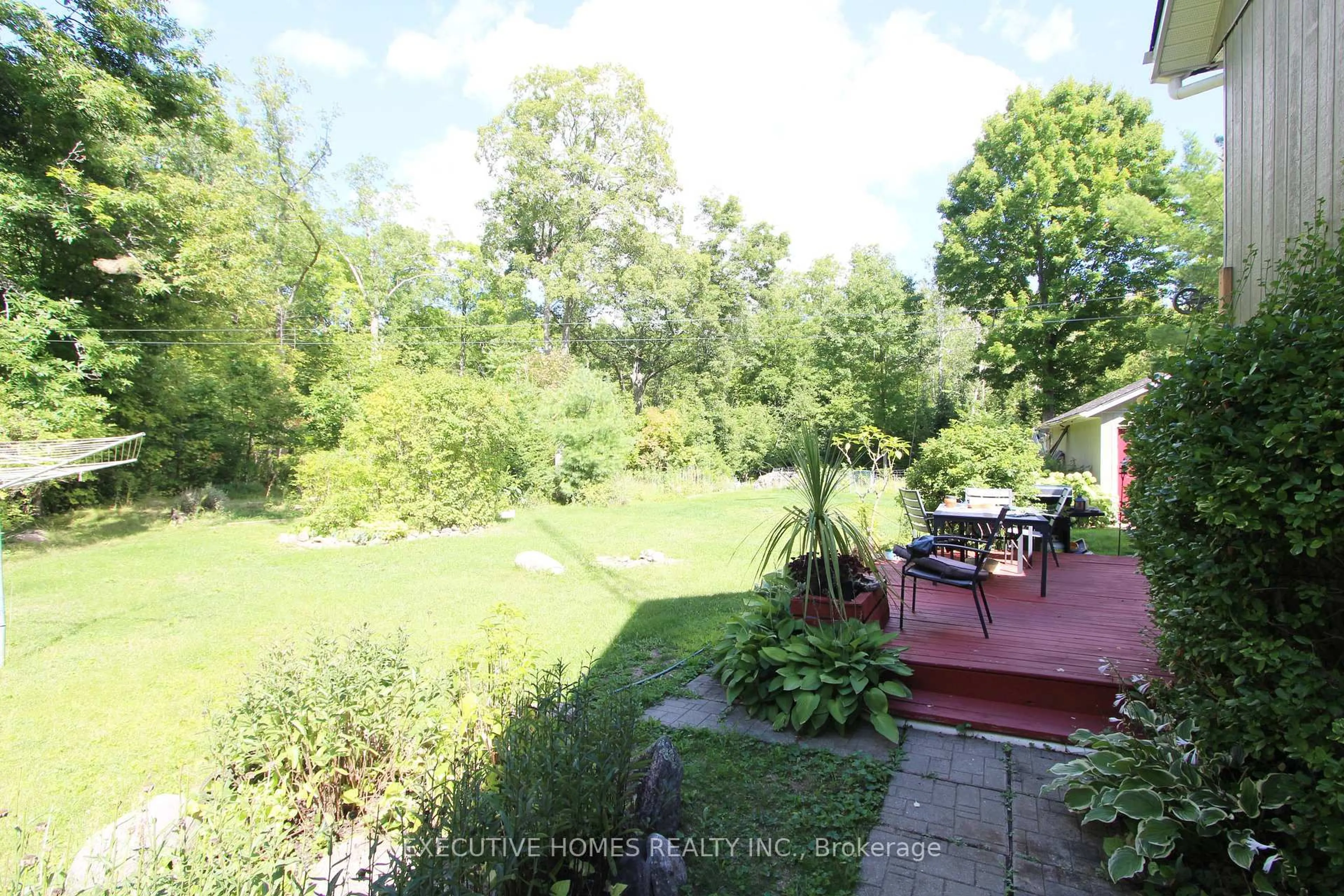 A pic from outside/outdoor area/front of a property/back of a property/a pic from drone, forest/trees view for 28 Woodlawn Dr, Trent Hills Ontario K0L 1Y0