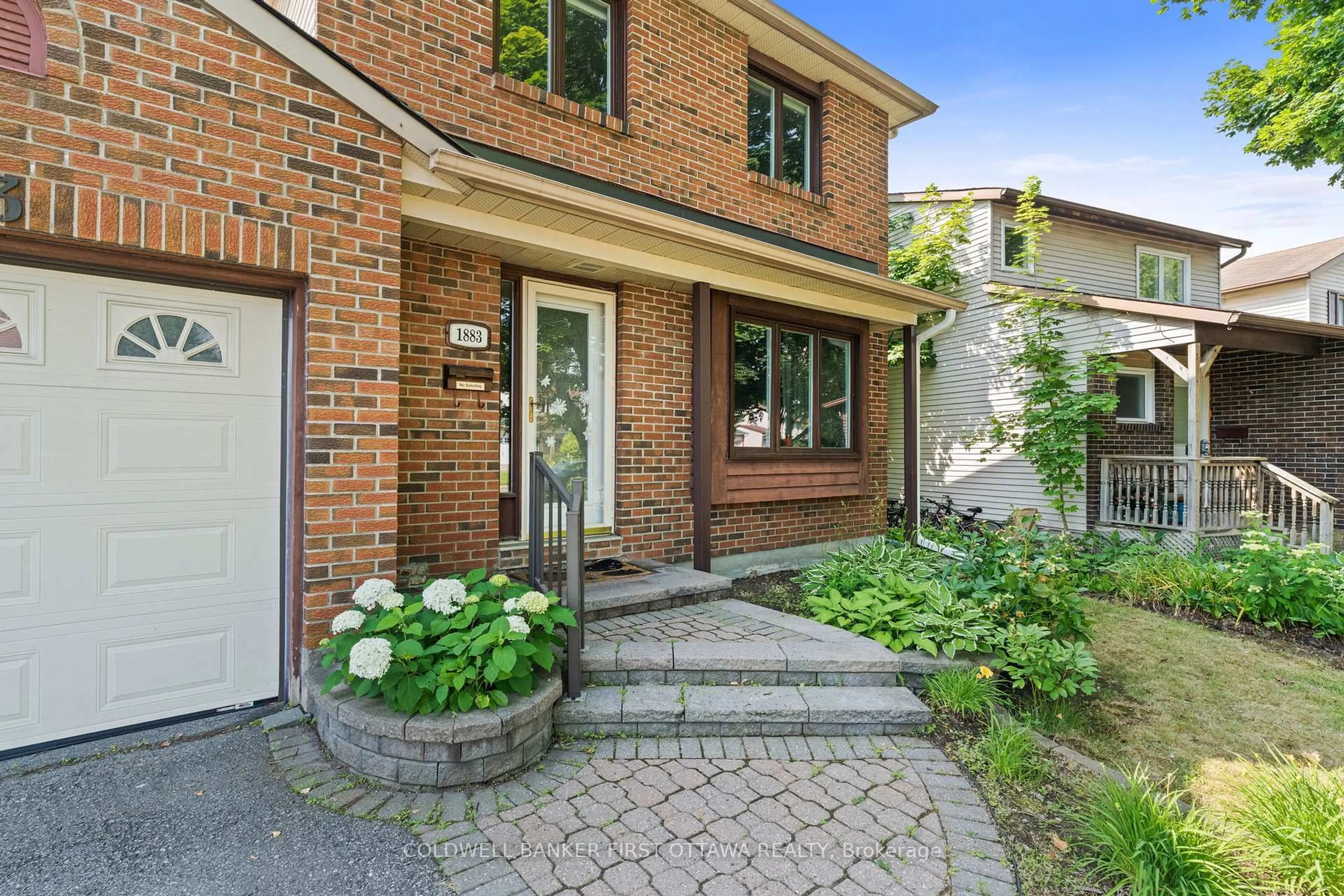 Home with brick exterior material, street for 1883 DES PRAIRIES Ave, Ottawa Ontario K1E 2R5