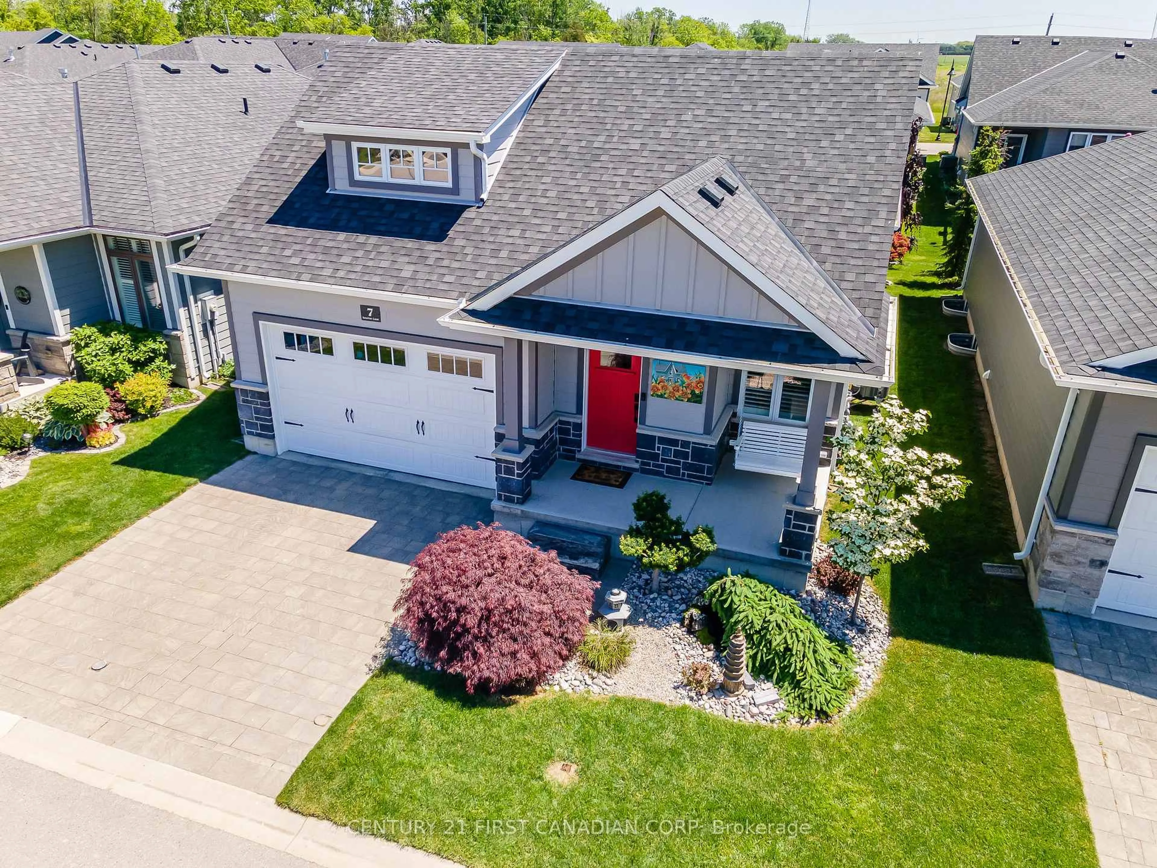 A pic from outside/outdoor area/front of a property/back of a property/a pic from drone, street for 7 Sunrise Lane, Lambton Shores Ontario N0M 1T0