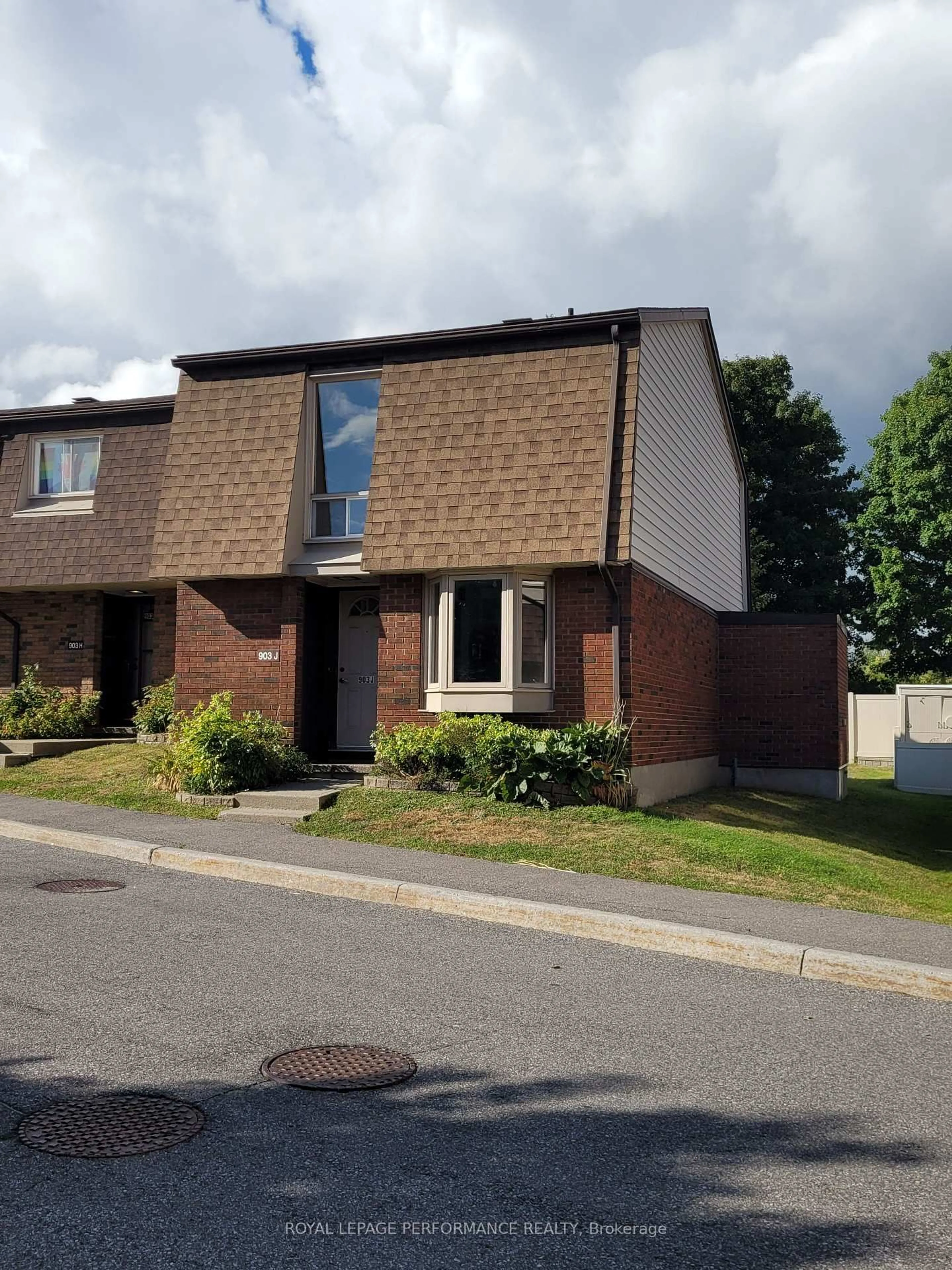 Home with brick exterior material, street for 903J Elmsmere Rd, Ottawa Ontario K1J 8G4