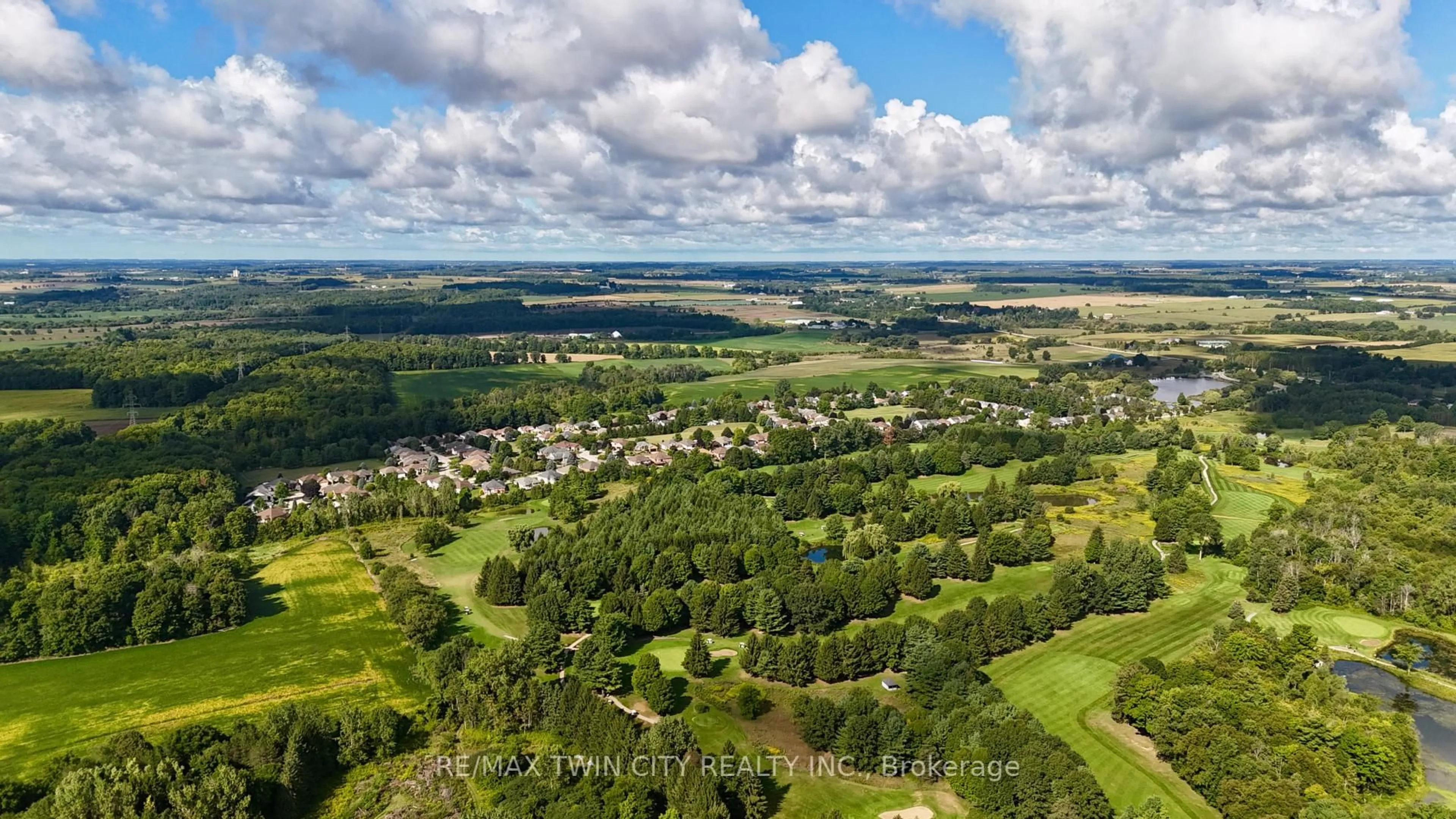 A pic from outside/outdoor area/front of a property/back of a property/a pic from drone, forest/trees view for 185 Golf Links Dr, Wilmot Ontario N3A 3N9