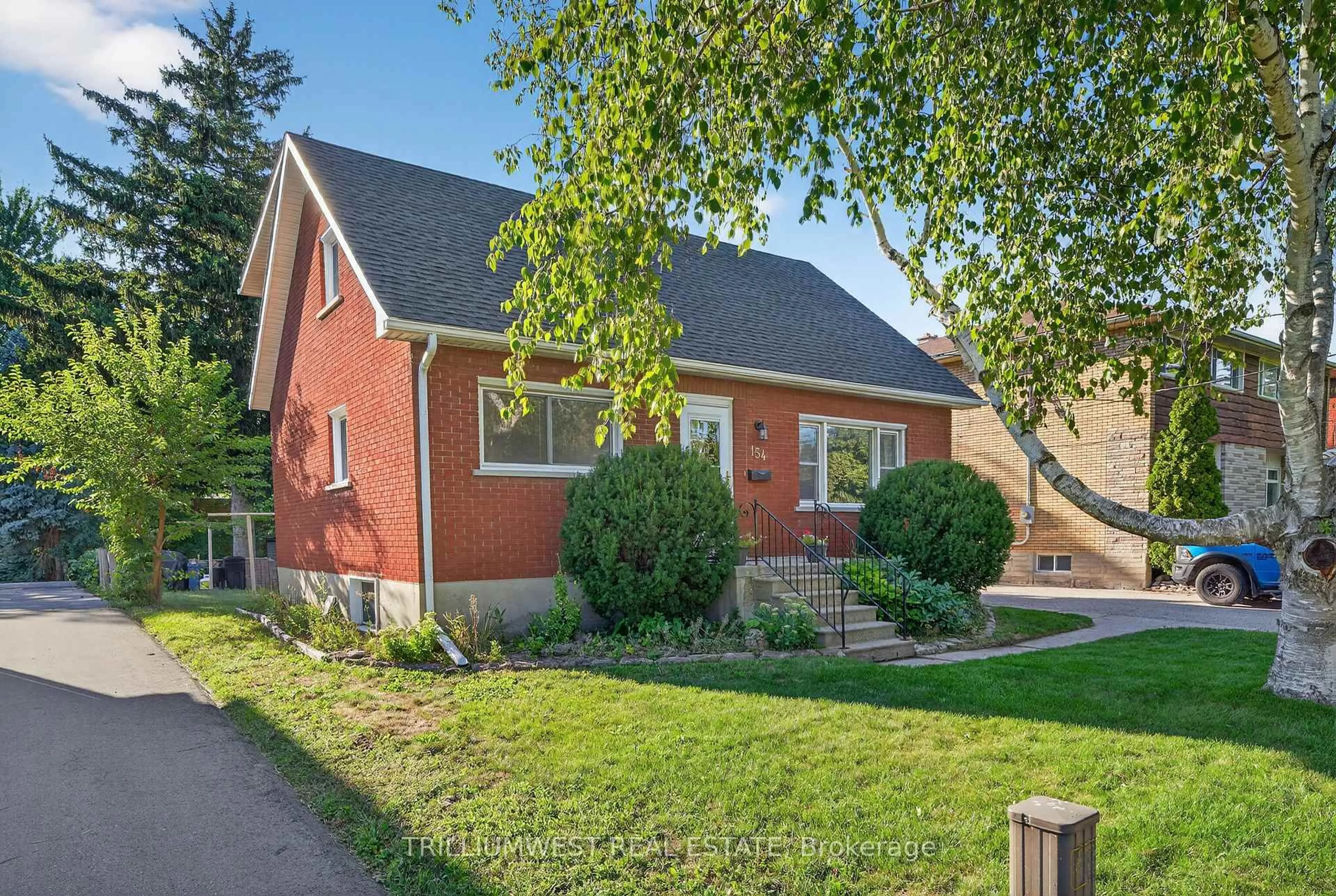 Home with brick exterior material, street for 154 Montgomery Rd, Kitchener Ontario N2H 3P6