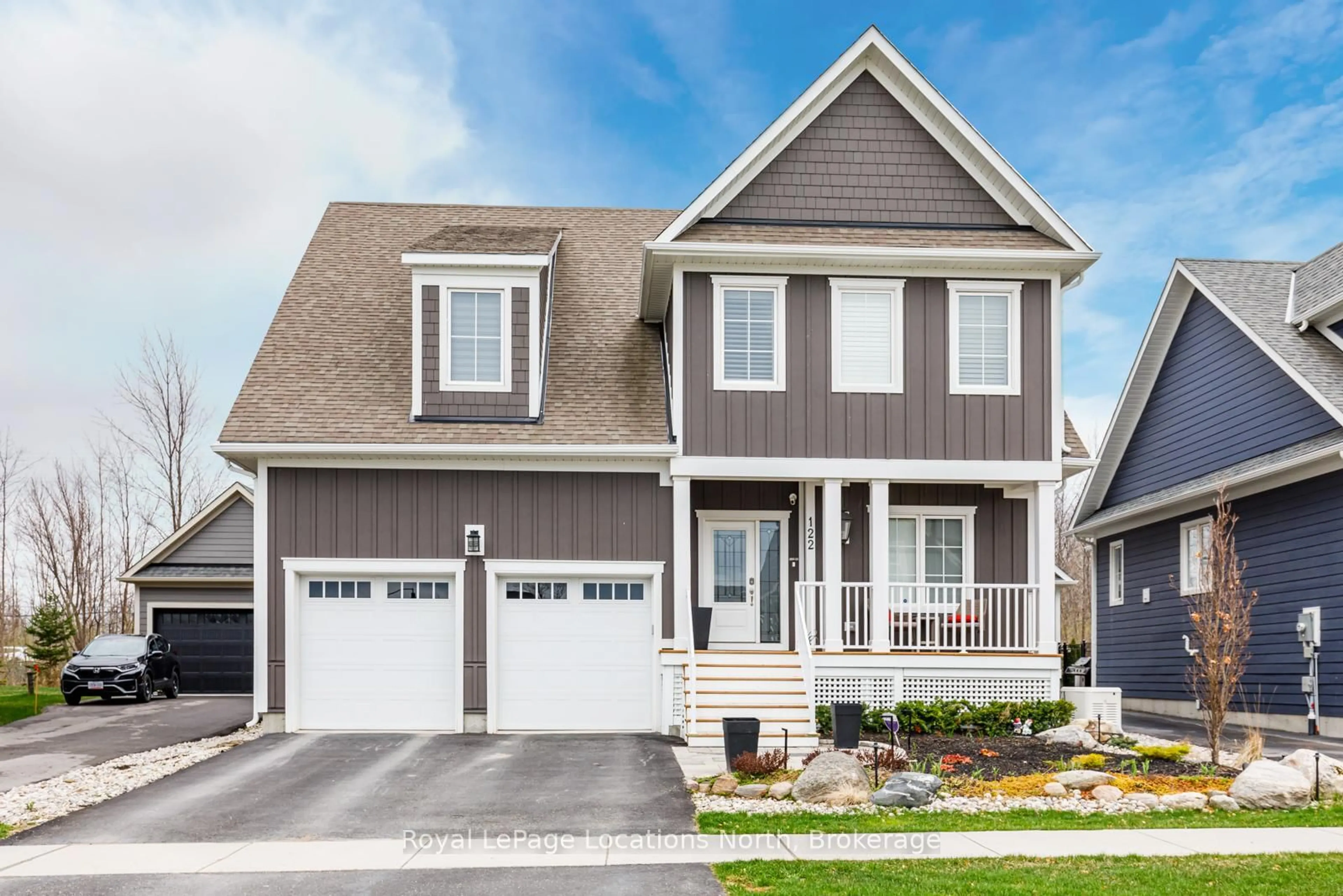 Home with vinyl exterior material, street for 122 YELLOW BIRCH Cres, Blue Mountains Ontario L9Y 0Y5