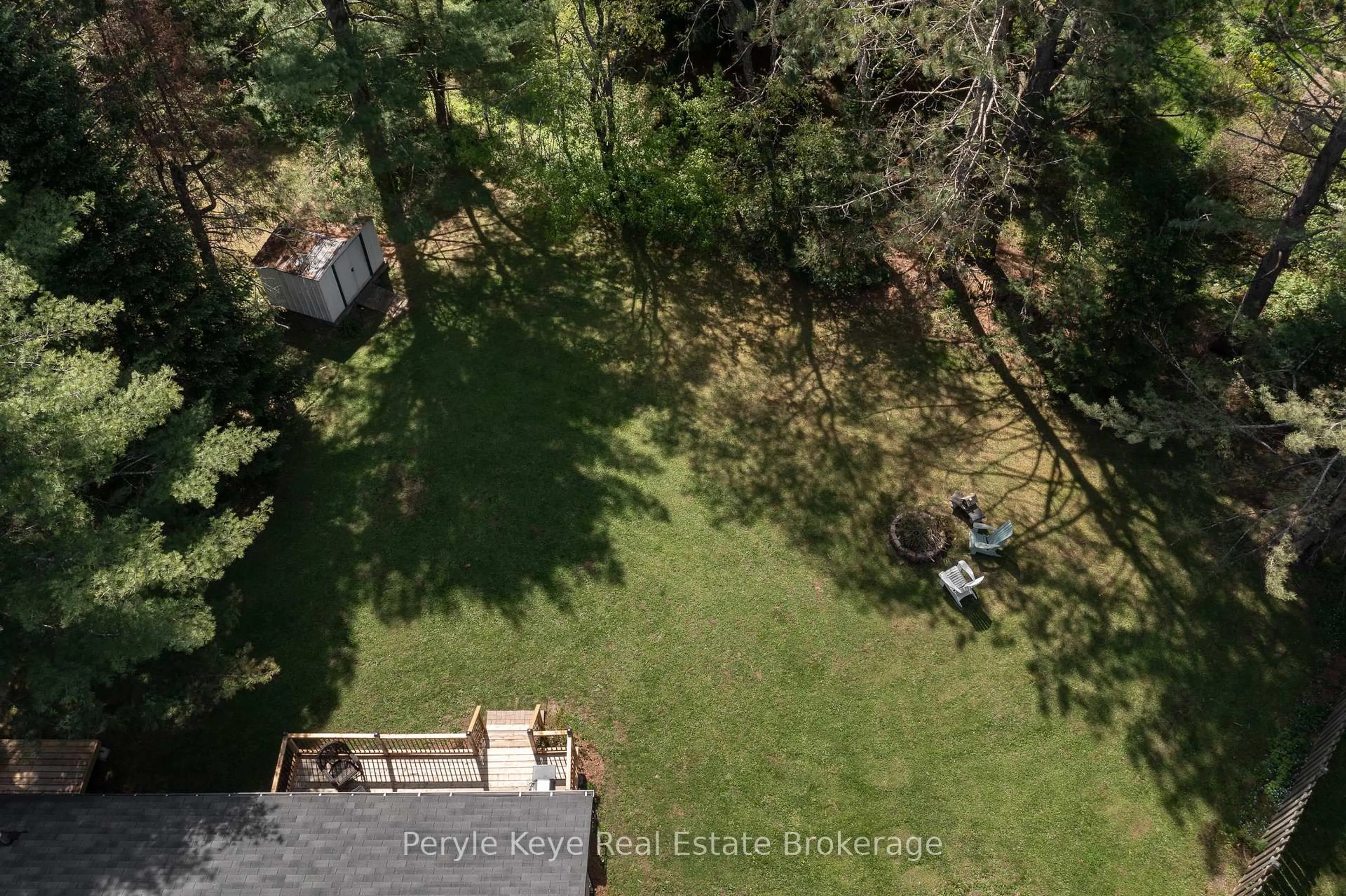 A pic from outside/outdoor area/front of a property/back of a property/a pic from drone, forest/trees view for 38 Andrea Dr, Bracebridge Ontario P1L 1C5