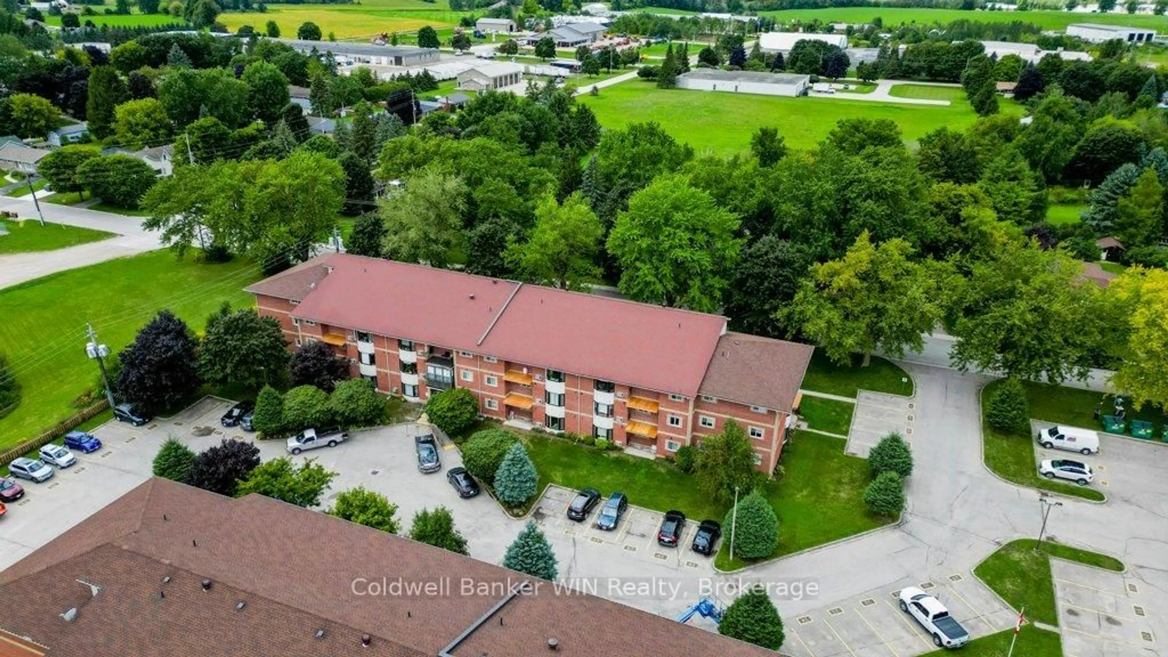 A pic from outside/outdoor area/front of a property/back of a property/a pic from drone, building for 460 DURHAM St #309, Wellington North Ontario N0G 2L1