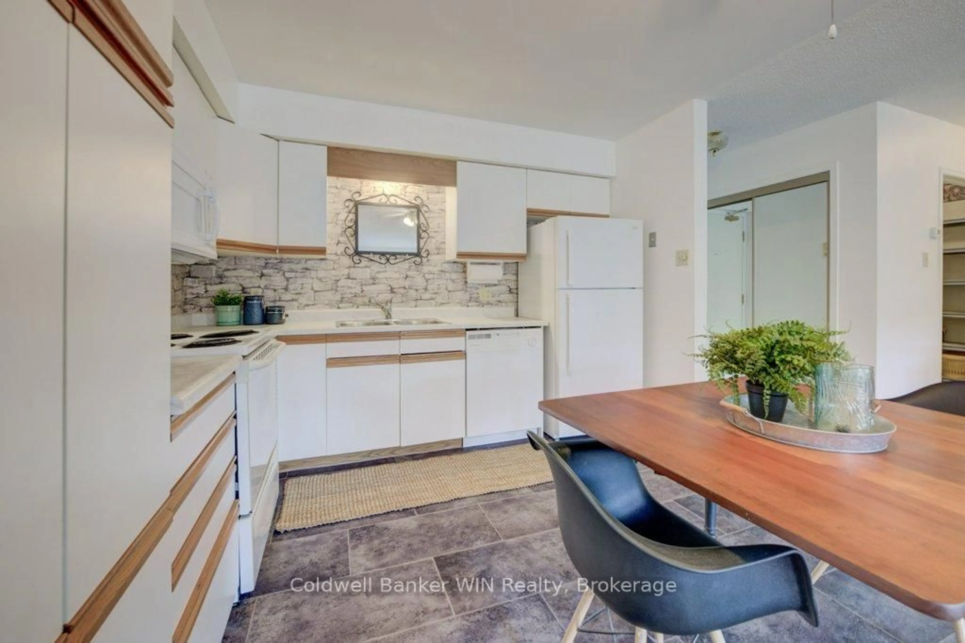 Open concept kitchen, ceramic/tile floor for 460 DURHAM St #309, Wellington North Ontario N0G 2L1