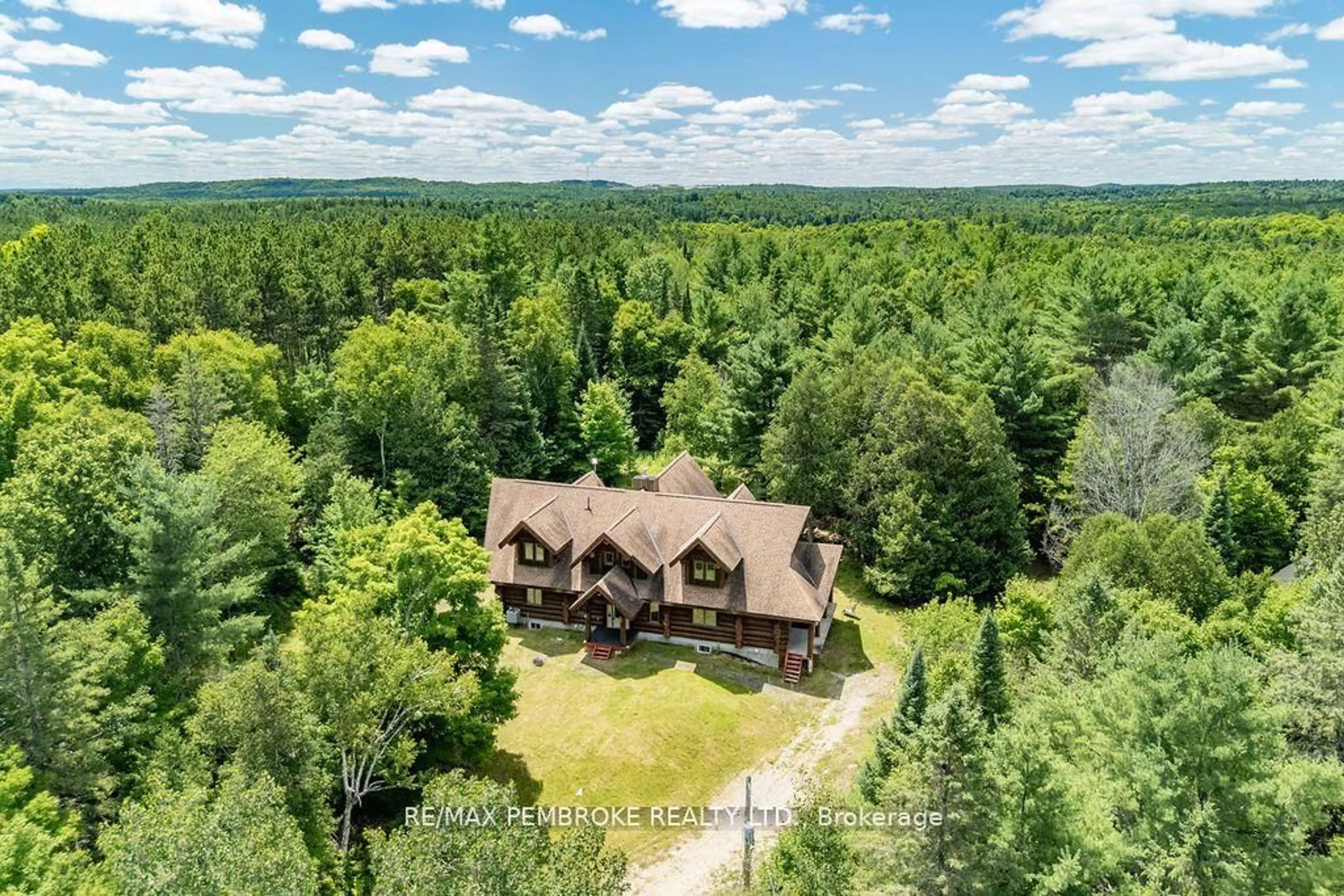 A pic from outside/outdoor area/front of a property/back of a property/a pic from drone, forest/trees view for 2467 Darling Rd, Clayton Ontario K0A 1P0