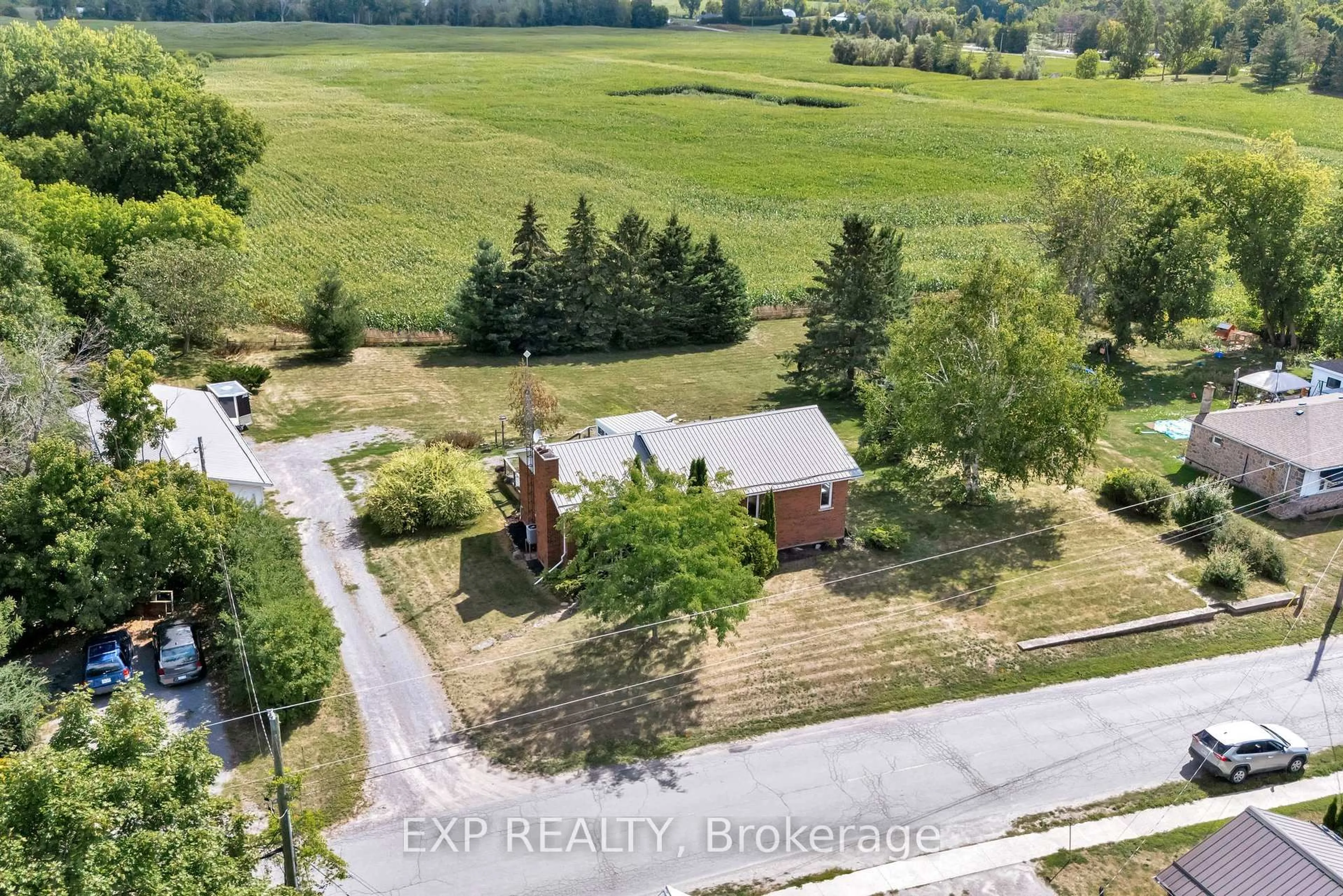 A pic from outside/outdoor area/front of a property/back of a property/a pic from drone, street for 112 Stoco Rd, Tweed Ontario K0K 3J0