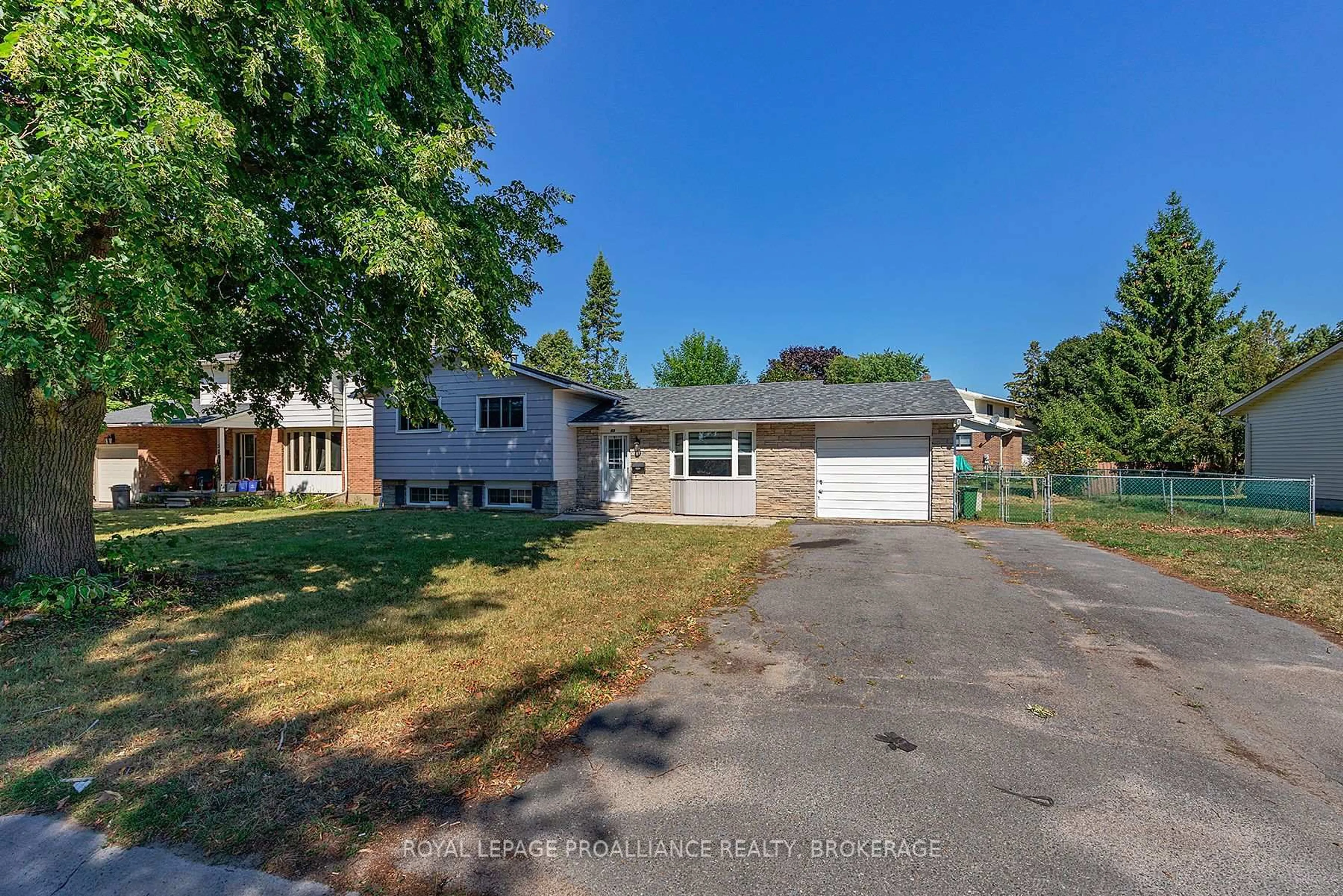 A pic from outside/outdoor area/front of a property/back of a property/a pic from drone, street for 63 Old Oak Rd, Kingston Ontario K7M 6X2