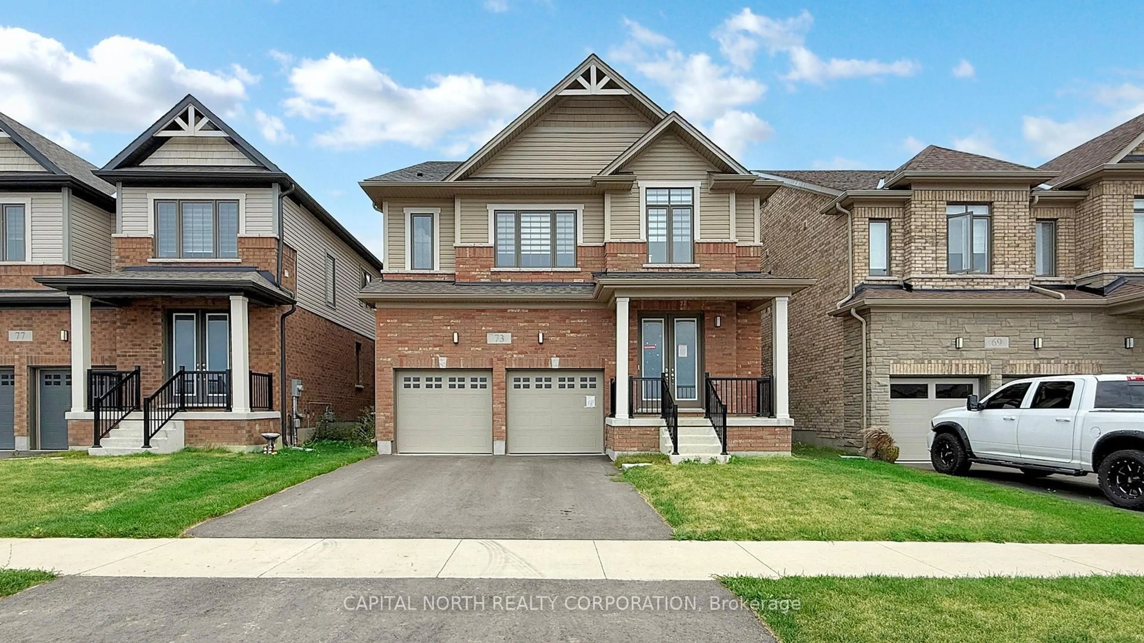 Home with brick exterior material, street for 73 Rustic Oak Tr, North Dumfries Ontario N0B 1E0