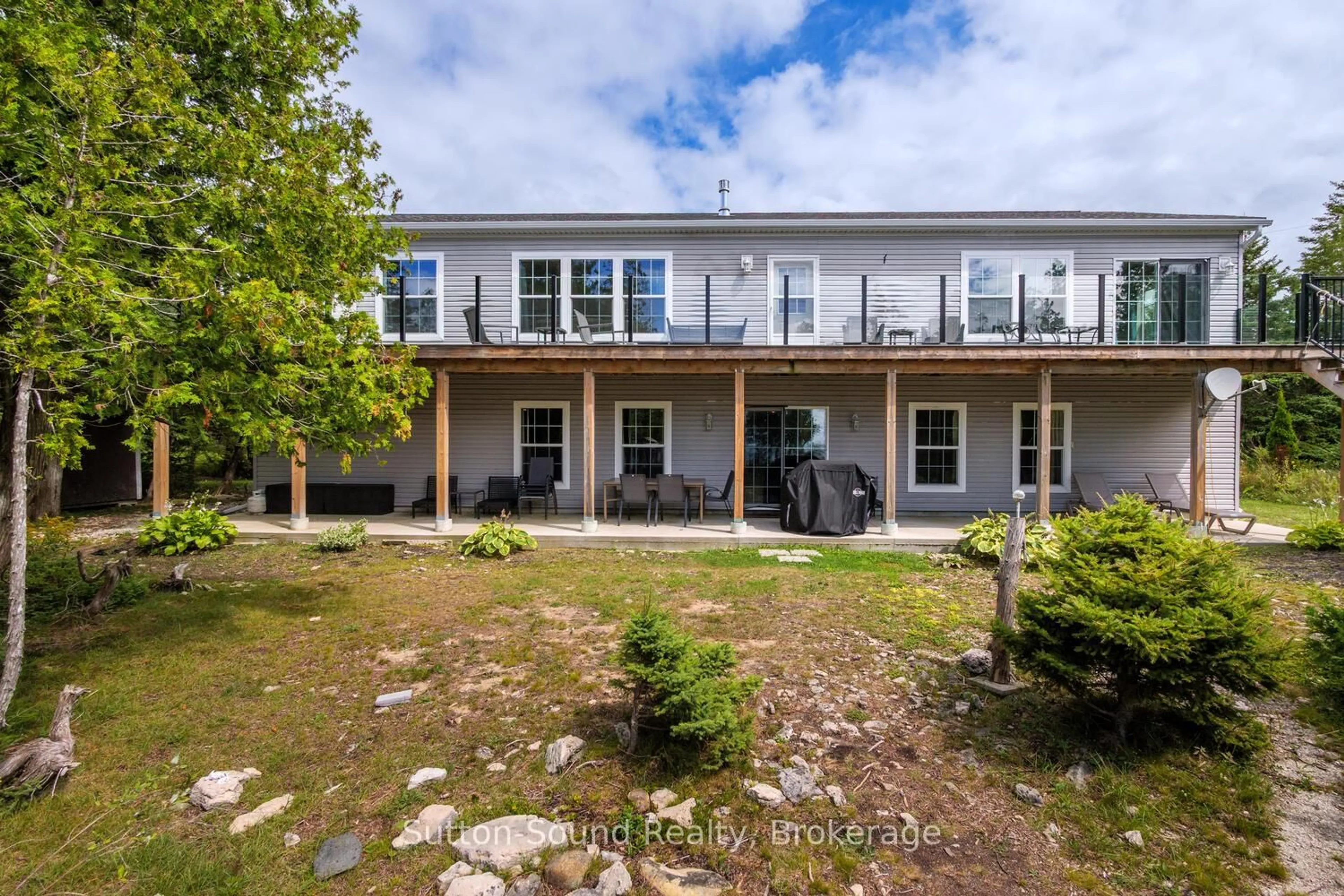 A pic from outside/outdoor area/front of a property/back of a property/a pic from drone, unknown for 682 Dorcas Bay Rd, Northern Bruce Peninsula Ontario N0H 2R0