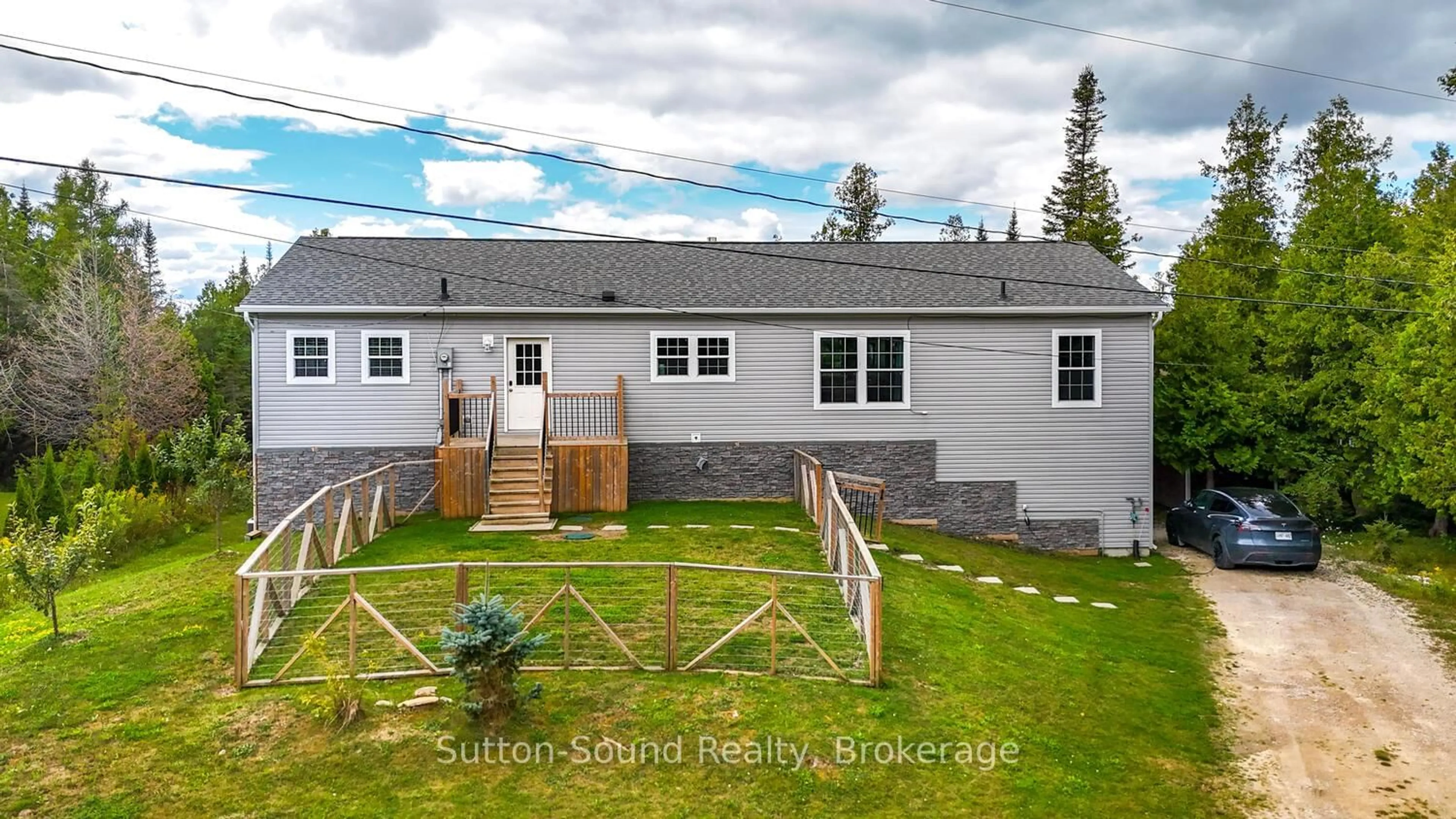 A pic from outside/outdoor area/front of a property/back of a property/a pic from drone, unknown for 682 Dorcas Bay Rd, Northern Bruce Peninsula Ontario N0H 2R0