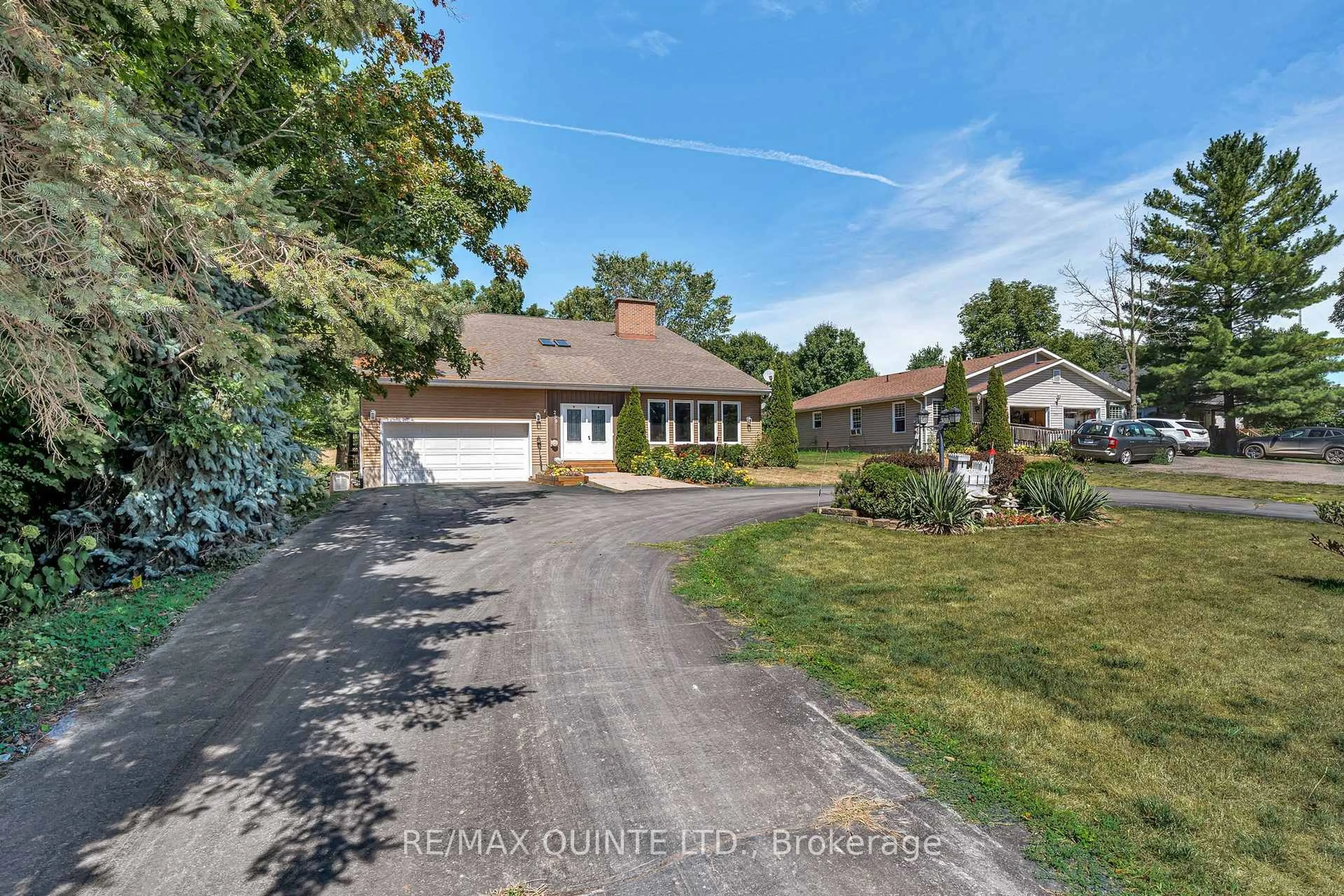 A pic from outside/outdoor area/front of a property/back of a property/a pic from drone, street for 290 St.Lawrence St, Madoc Ontario K0K 2K0