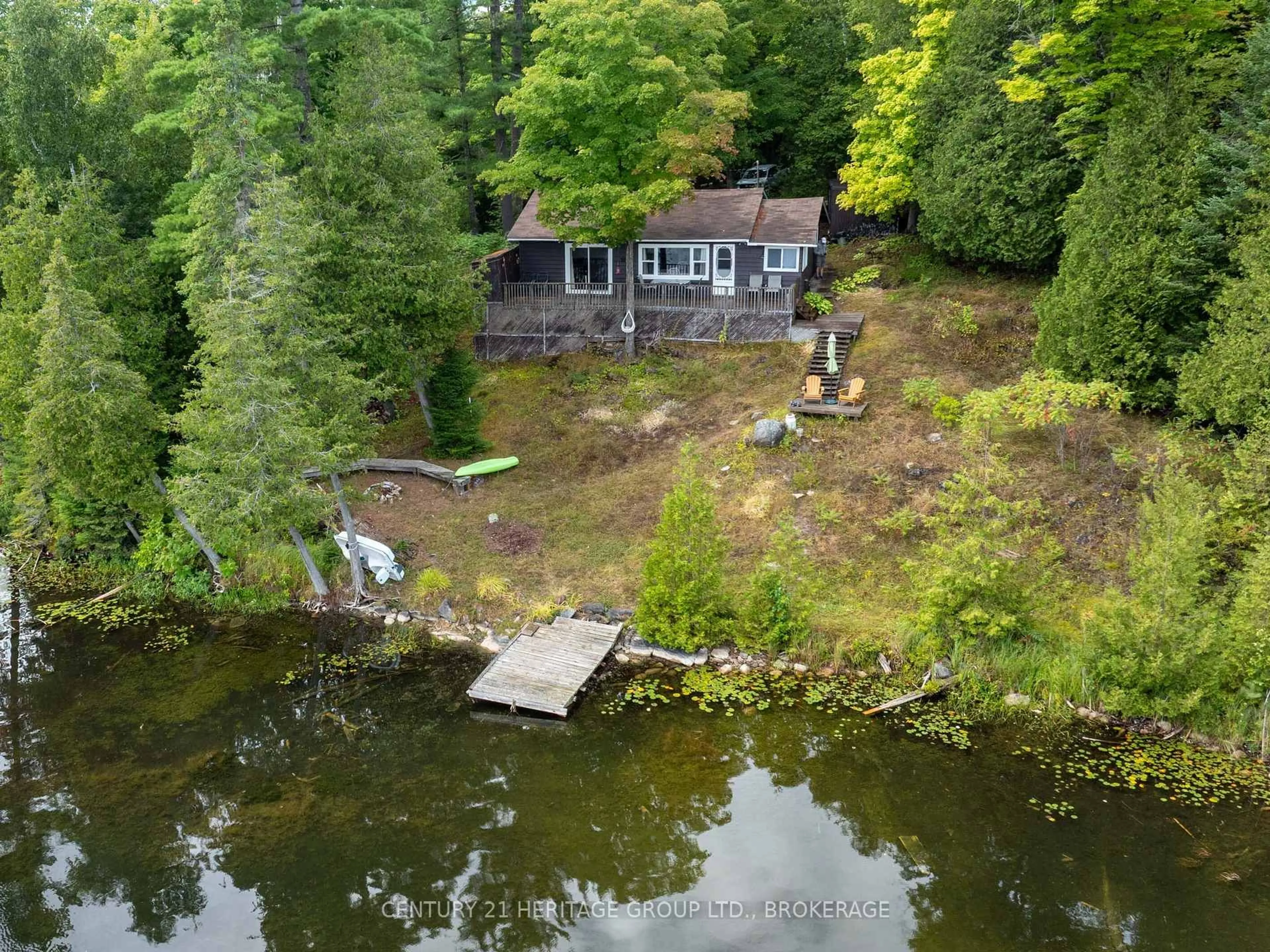 A pic from outside/outdoor area/front of a property/back of a property/a pic from drone, water/lake/river/ocean view for 1138A Watkins Lane, Ardoch Ontario K0H 1C0