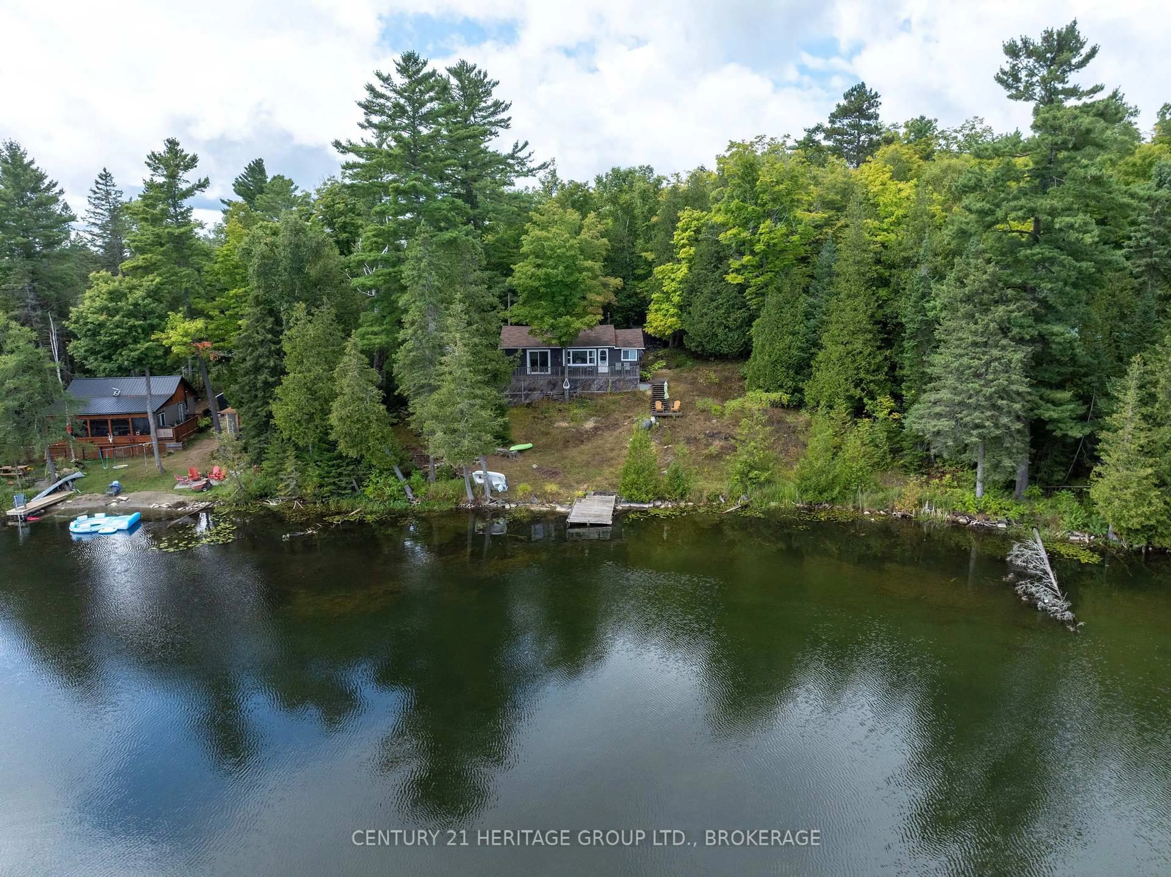 A pic from outside/outdoor area/front of a property/back of a property/a pic from drone, water/lake/river/ocean view for 1138A Watkins Lane, Ardoch Ontario K0H 1C0